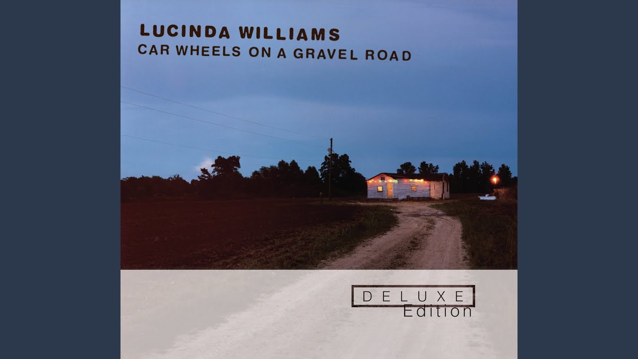 Car Wheels On A Gravel Road