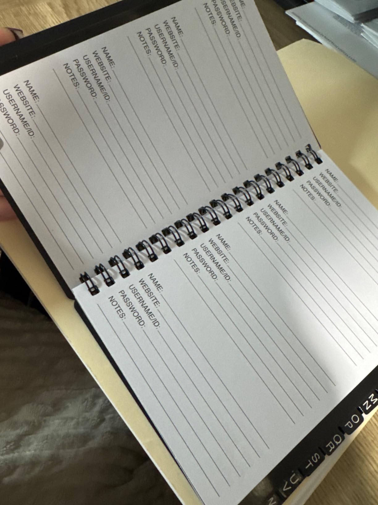 Juvale Password Book with Alphabetical Tabs - 5 x 7 in, 2-Pack, Gray & Black, 80 Lined Pages, Spiral-Bound, Plastic Cover - Password Notebook & Log Book for Username & Login Management Customer Review Juvale Password Book with Alphabetical Tabs - 5 x 7 in, 2-Pack, Gray & Black, 80 Lined Pages, Spiral-Bound, Plastic Cover - Password Notebook & Log Book for Username & Login Management - Customer Photo 1
