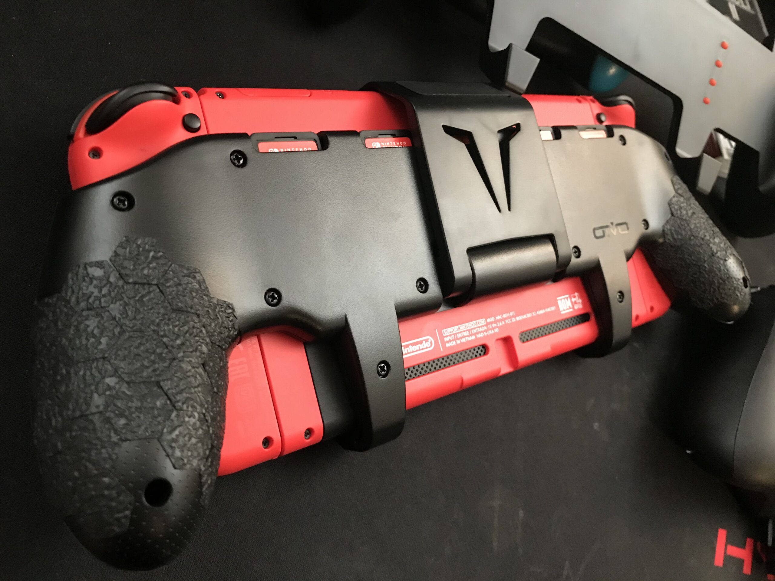 Switch Grip with Upgraded Adjustable Stand, Compatible with Nintendo Switch & OLED, OIVO Asymmetrical Grip with Adjustable Stand and 5 Game Slots-4 Thumb Caps Included Customer Review Switch Grip with Upgraded Adjustable Stand, Compatible with Nintendo Switch & OLED, OIVO Asymmetrical Grip with Adjustable Stand and 5 Game Slots-4 Thumb Caps Included - Customer Photo 1