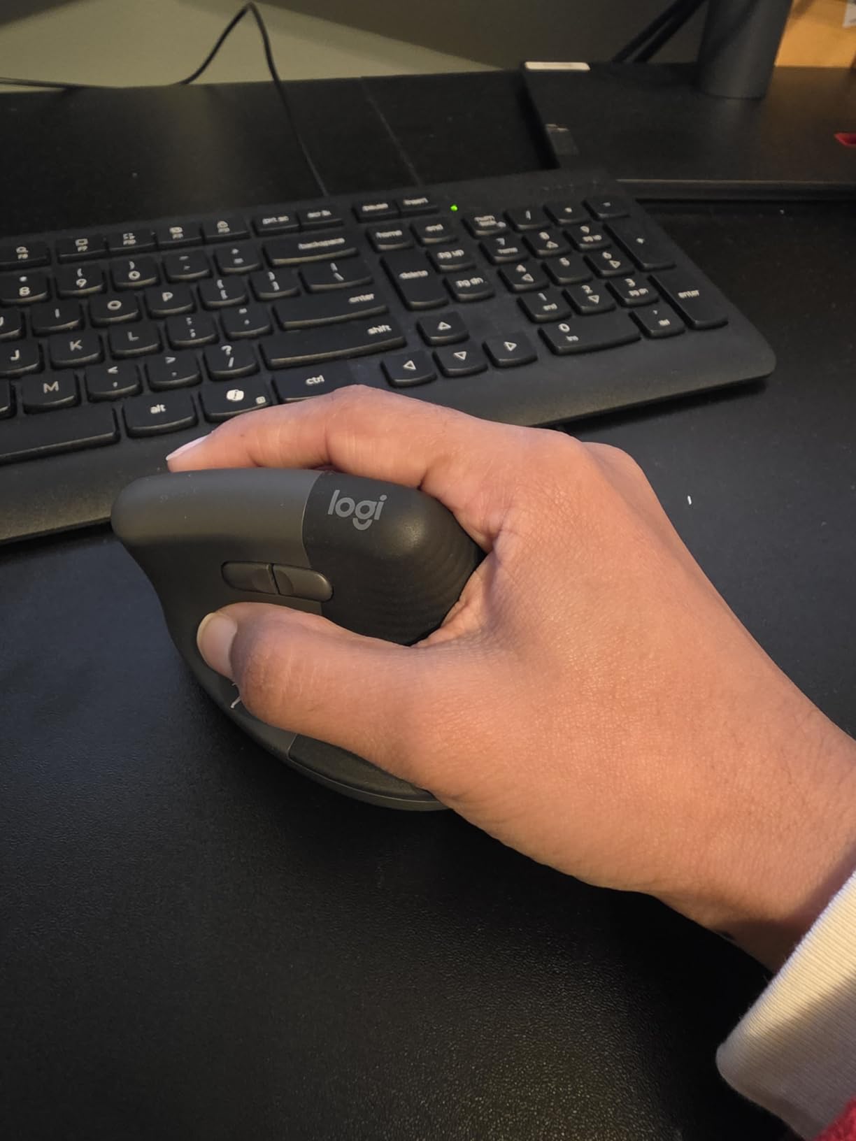 Logitech Lift Vertical Ergonomic Mouse, Wireless Bluetooth or USB Receiver, Quiet Clicks, 4 Buttons, Right Hand Wireless Mouse, Windows/macOS/iPadOS, Laptop, PC - Graphite Customer Review Logitech Lift Vertical Ergonomic Mouse, Wireless Bluetooth or USB Receiver, Quiet Clicks, 4 Buttons, Right Hand Wireless Mouse, Windows/macOS/iPadOS, Laptop, PC - Graphite - Customer Photo 1