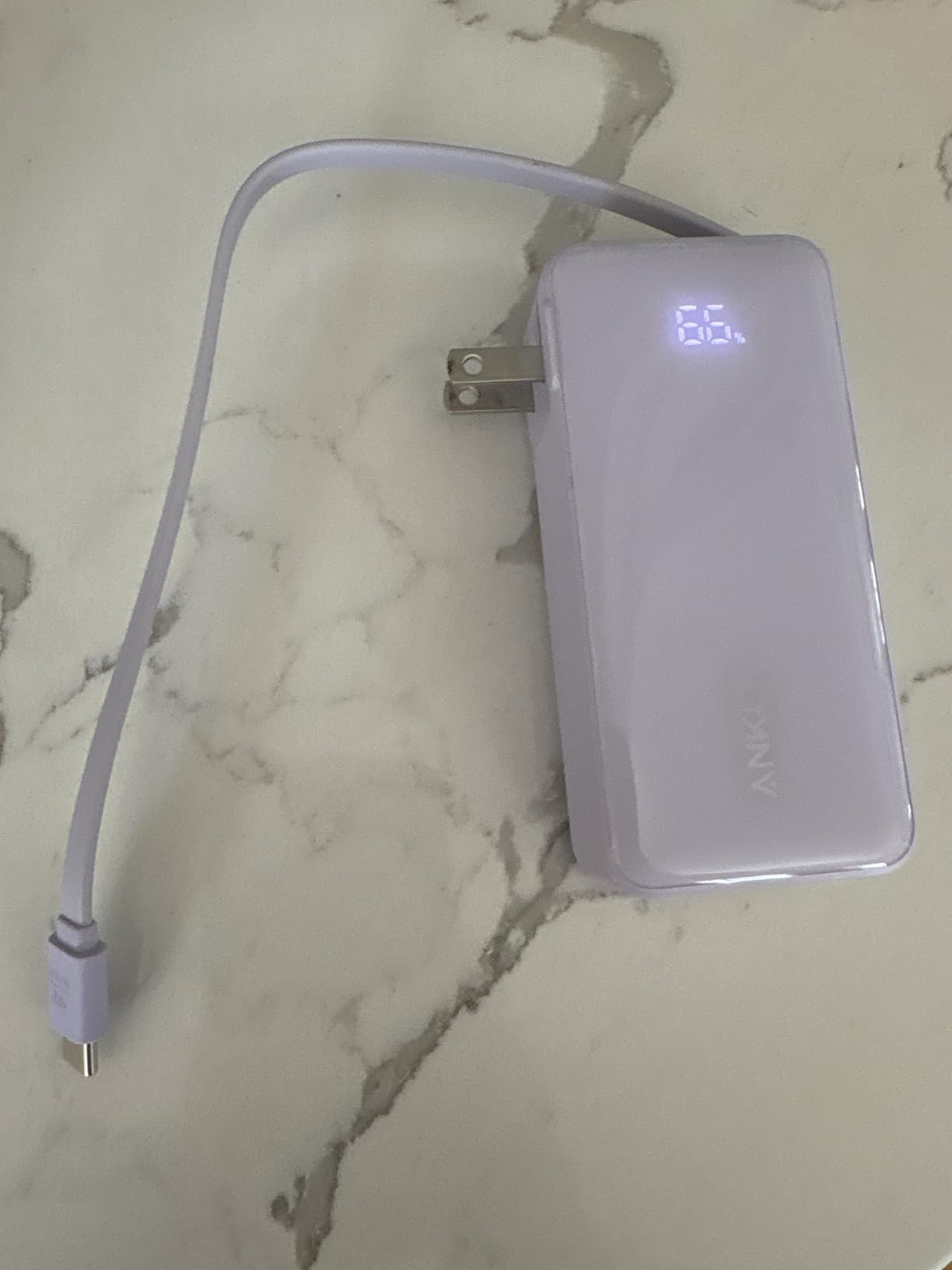 Anker Nano 3-in-1 Portable iPhone Charger, 10,000mAh Power Bank with Built-in USB-C Cable and Foldable Wall Plug, 30W Max Battery Pack, Travel Essentials for iPhone 17/16/15 Series, Galaxy, MacBook - Customer Photo 4