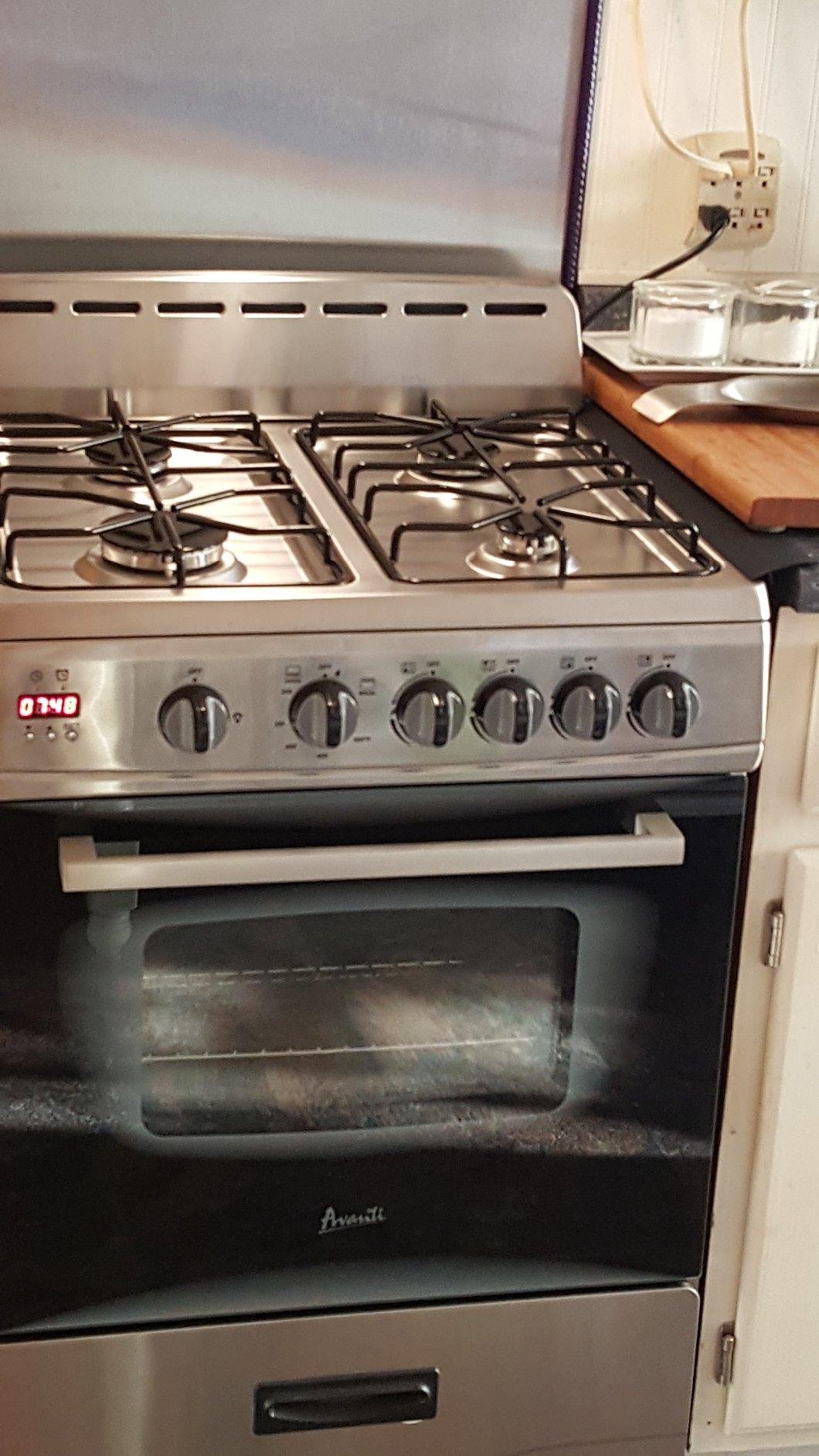 Avanti Gas Range Oven, Compact Freestanding Design, 4 Sealed Burners with Electronic Ignition, 2.6 Cu.Ft. Capacity Features Storage Drawer Broiler and Accessories, 24-Inch, Black Customer Review Avanti Gas Range Oven, Compact Freestanding Design, 4 Sealed Burners with Electronic Ignition, 2.6 Cu.Ft. Capacity Features Storage Drawer Broiler and Accessories, 24-Inch, Black - Customer Photo 1