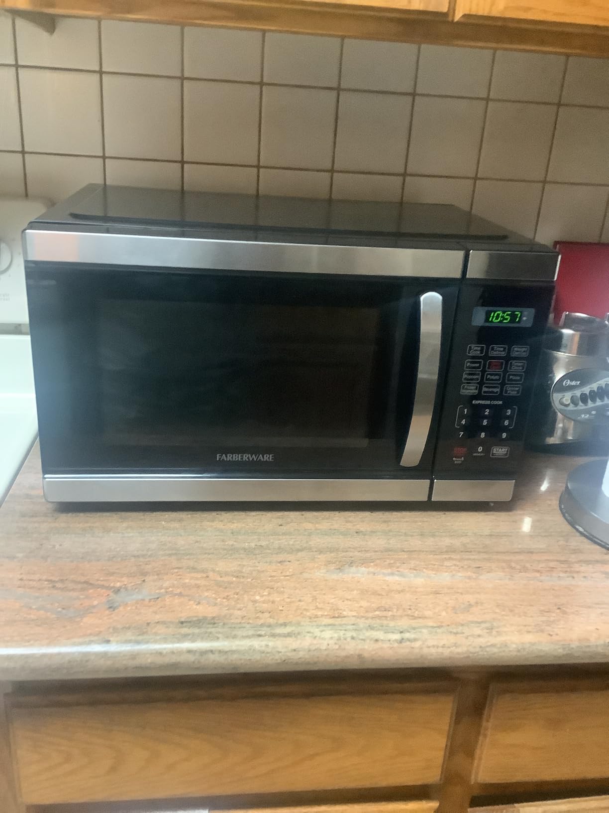 Farberware 1.1 Cu. Ft. Countertop Microwave Oven - 1000 Watts Power, Auto Cook Settings, Defrost, Easy Clean and Child Safety Lock - Stainless - Customer Photo 2