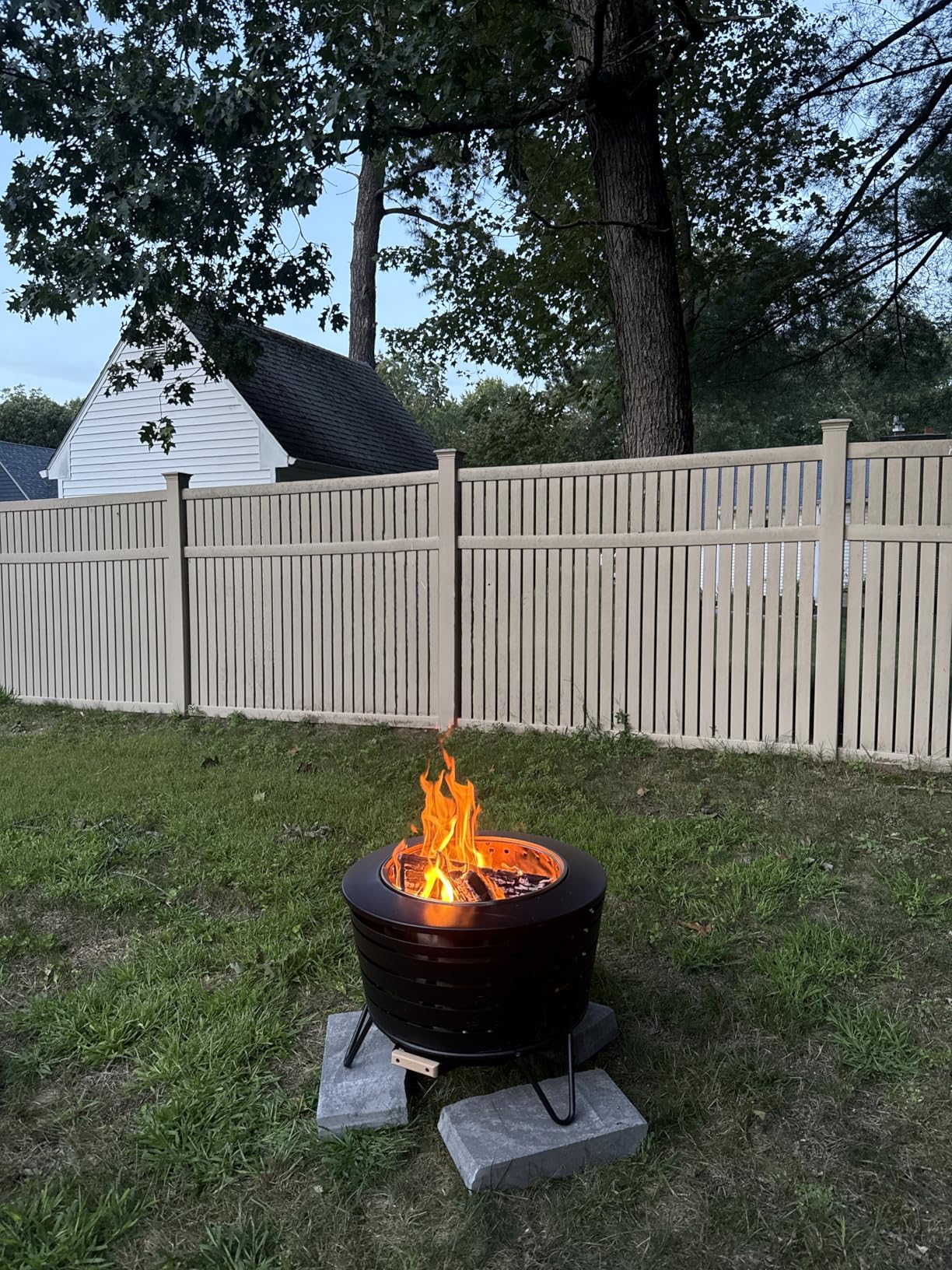 TIKI Patio Fire Pit Bundle – 25-Inch Smokeless Wood Burning Outdoor Fire Pit for Backyard, Patio, Deck & Garden with Removable Ash Pan, Stand & Weather-Resistant Cover – Modern Black Stainless Steel - Customer Photo 2