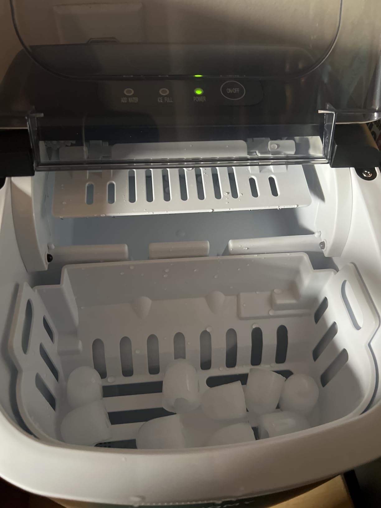 EUHOMY Countertop Ice Maker Machine with Handle, 26lbs in 24Hrs, 9 Ice Cubes Ready in 6 Mins, Auto-Cleaning Portable Ice Maker with Basket and Scoop, for Home/Kitchen/Camping/RV. (Black) customer photo 1