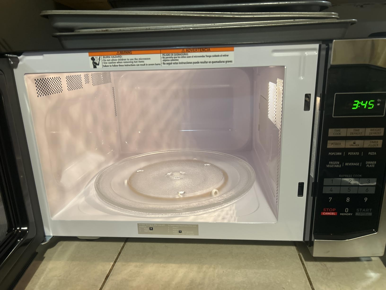 Magic Chef Compact Countertop Microwave Oven, 1000 Watts, Black, 1.1 Cu. Ft. - Digital Kitchen Appliance with One-Touch Cooking, Child Lock, Timer, Reheat, Defrost and 10 Power Levels - Customer Photo 2