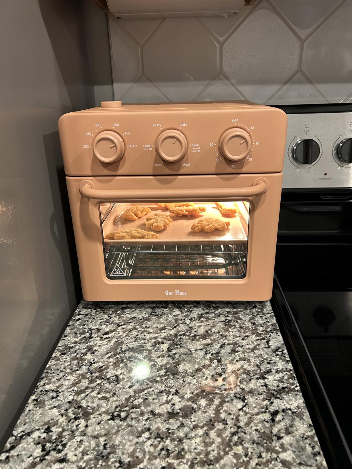 Our Place Wonder Oven | 6-in-1 Stainless Steel Air Fryer Toaster Oven Combo with Basket, Rack, Pan & Tray | Compact 13 QT Countertop Capacity - Toast, Roast, Bake, Reheat, Broil & Steam | Steam Customer Review Our Place Wonder Oven | 6-in-1 Stainless Steel Air Fryer Toaster Oven Combo with Basket, Rack, Pan & Tray | Compact 13 QT Countertop Capacity - Toast, Roast, Bake, Reheat, Broil & Steam | Steam - Customer Photo 1