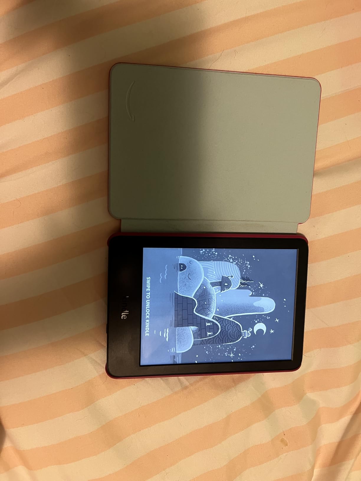 Kindle Kids 16GB (2024 release) - If it breaks, we will replace it, includes ad-free books and cover - Ocean Explorer customer photo 2