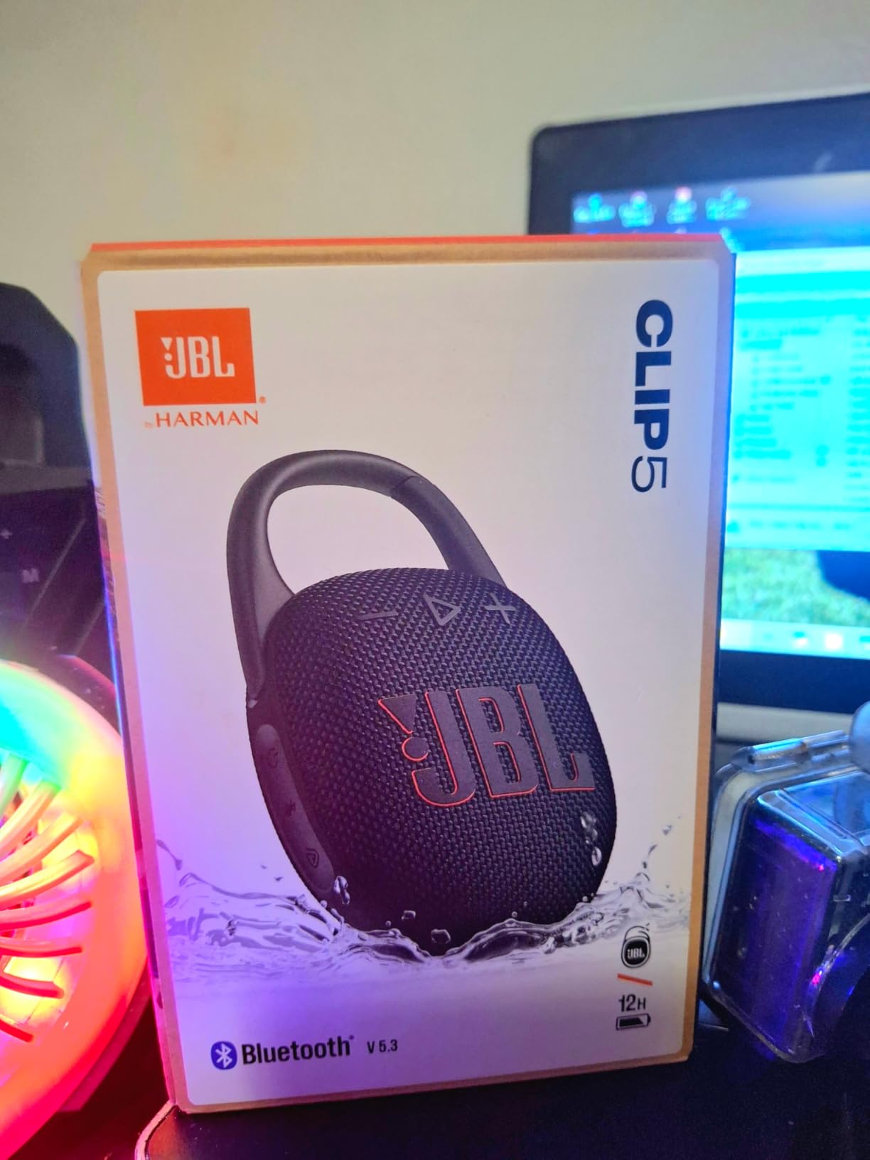 JBL Clip 5 - Ultra-Portable, Waterproof & Dustproof Bluetooth Speaker, Big JBL Pro Sound with Punchy bass, Integrated Carabiner, Up to 12 Hours of Playtime, Made in Part with Recycled Materials (Black) Customer Review JBL Clip 5 - Ultra-Portable, Waterproof & Dustproof Bluetooth Speaker, Big JBL Pro Sound with Punchy bass, Integrated Carabiner, Up to 12 Hours of Playtime, Made in Part with Recycled Materials (Black) - Customer Photo 1