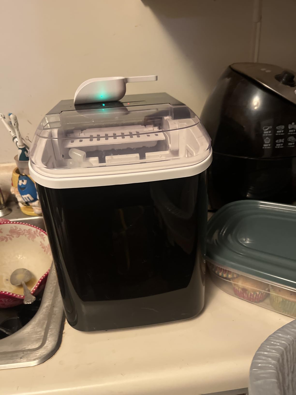 DUMOS Countertop Ice Maker with Handle, 26lbs/24H Portable Ice Machine, 9 Bullet Ice Cubes Ready in 6 Mins, Self-Cleaning, Quiet Compact Ice Maker for Home, Kitchen, RV, Camping, Black Customer Review DUMOS Countertop Ice Maker with Handle, 26lbs/24H Portable Ice Machine, 9 Bullet Ice Cubes Ready in 6 Mins, Self-Cleaning, Quiet Compact Ice Maker for Home, Kitchen, RV, Camping, Black - Customer Photo 4