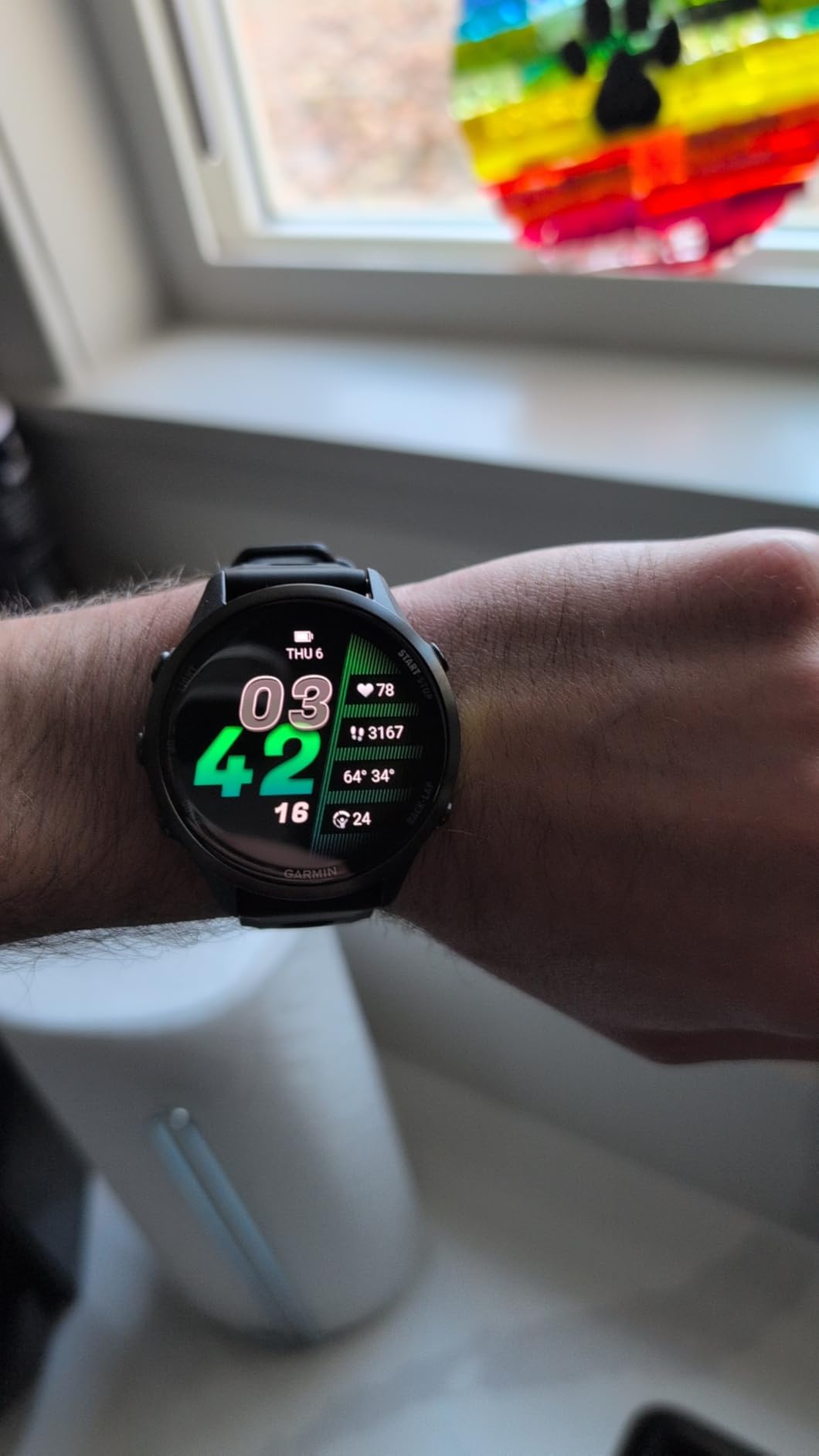 Forerunner 970 Premium GPS Running and Triathlon Smartwatch, AMOLED Display, Built-in LED Flashlight, Carbon Gray DLC Titanium with Black Case customer photo 2