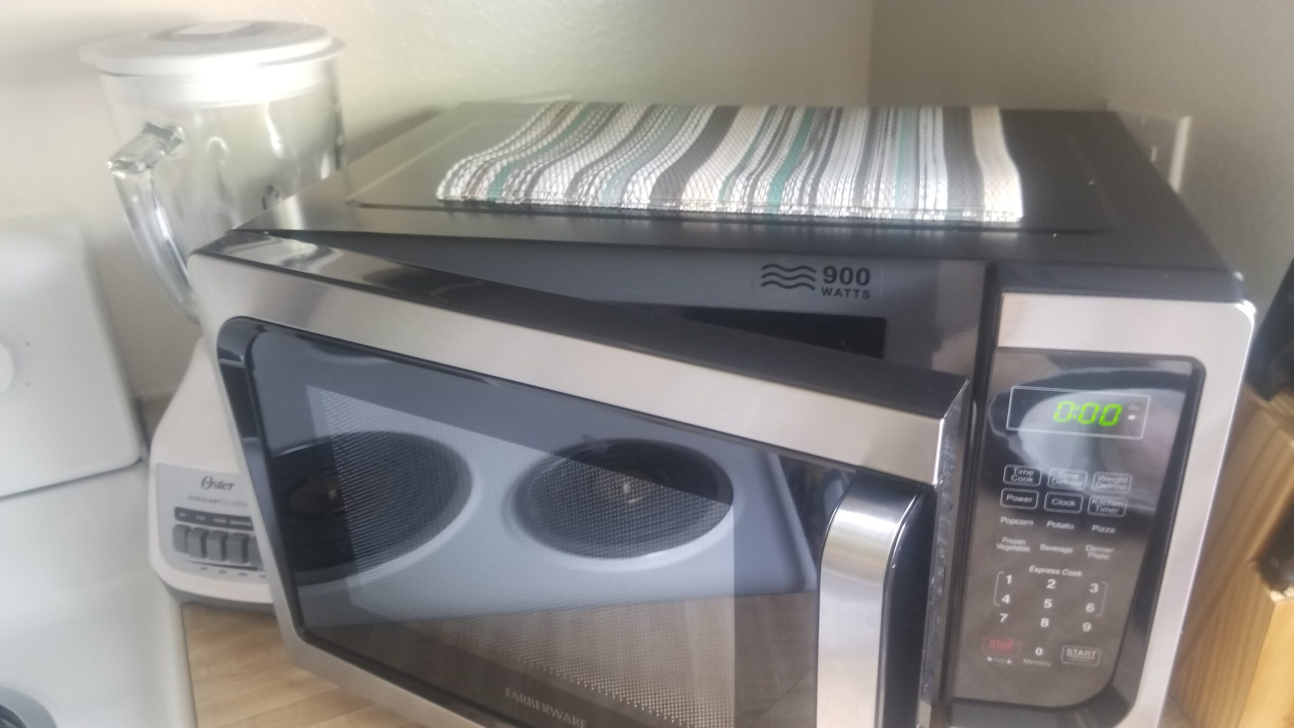 Farberware Over-the-Range Microwave Oven, 1.7 Cu. Ft., 1000W, Sensor Cooking, Auto Reheat, Multi-Stage Cooking, Melt/Soften Feature, Child Safety Lock, LED Display - Space Efficient & Powerful - Customer Photo 2