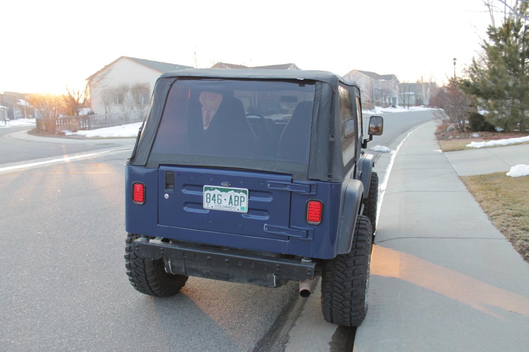 RAMPAGE PRODUCTS Frameless Trail Top for Jeep Wrangler TJ | Tinted Windows, Vinyl, Black Diamond | 109535 | Fits 1997-2006 Jeep Wrangler TJ (Excluding LI Unlimited) customer photo 1