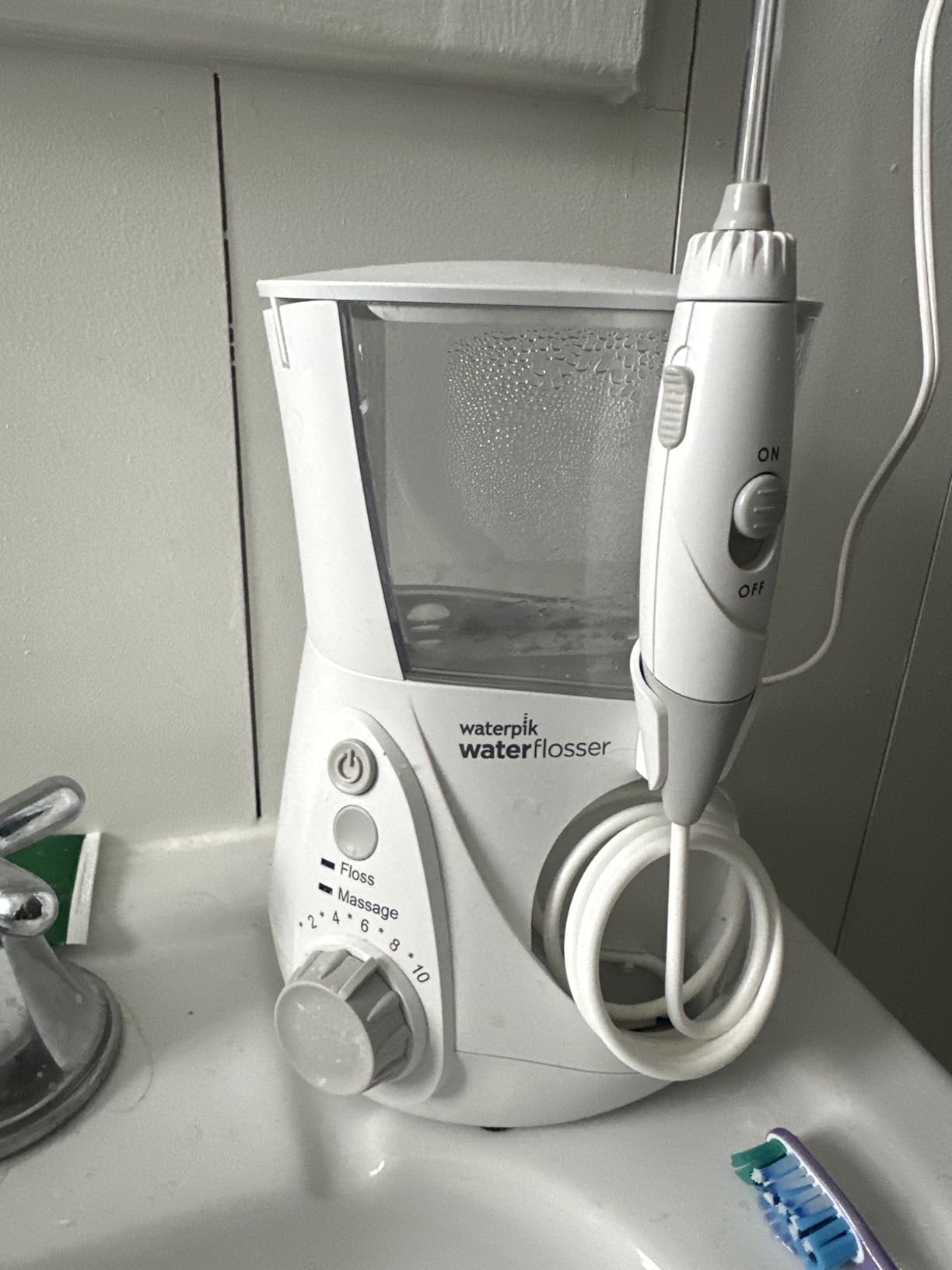 Waterpik Aquarius Water Flosser For Teeth Cleaning, Gums, Braces, Dental Care, Electric Power With 10 Settings, 7 Tips For Multiple Users And Needs, ADA Accepted, White WP-660 customer photo 2