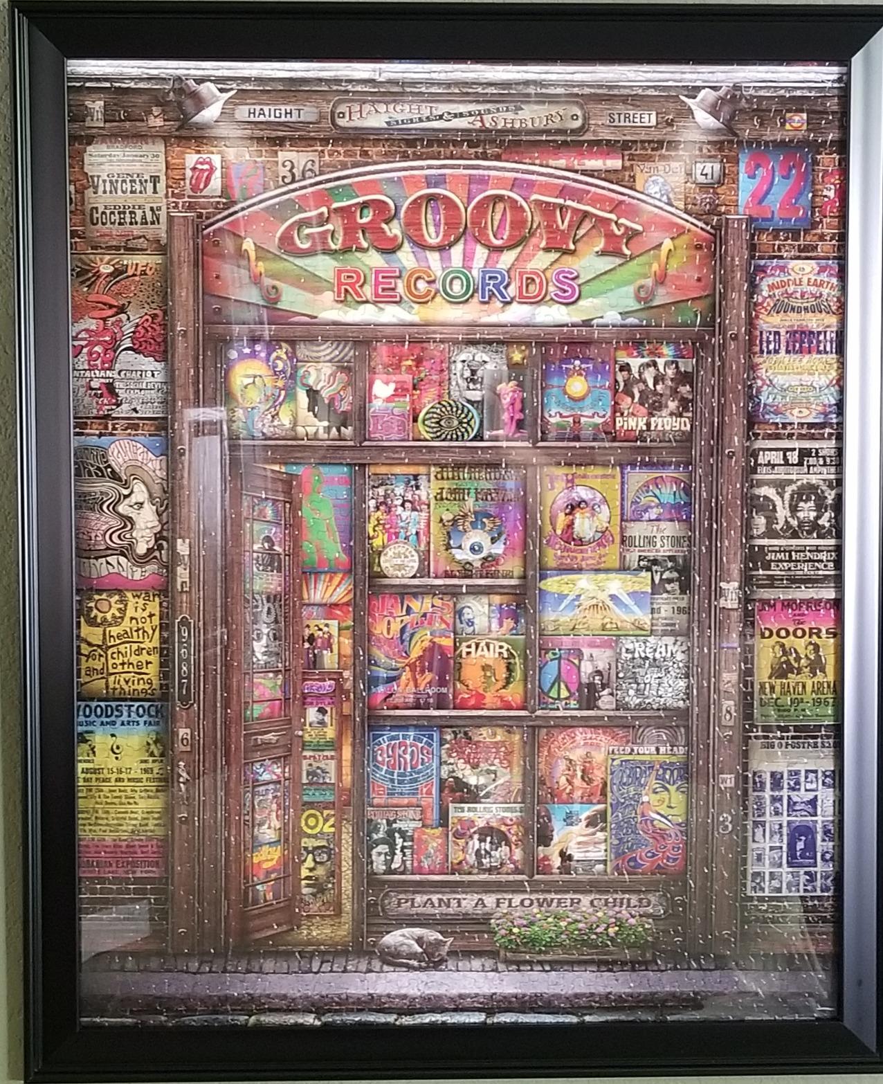 Groovy Records 1000 piece Jigsaw Puzzle for Adults features a colorful illustration of a classic record store customer photo 1