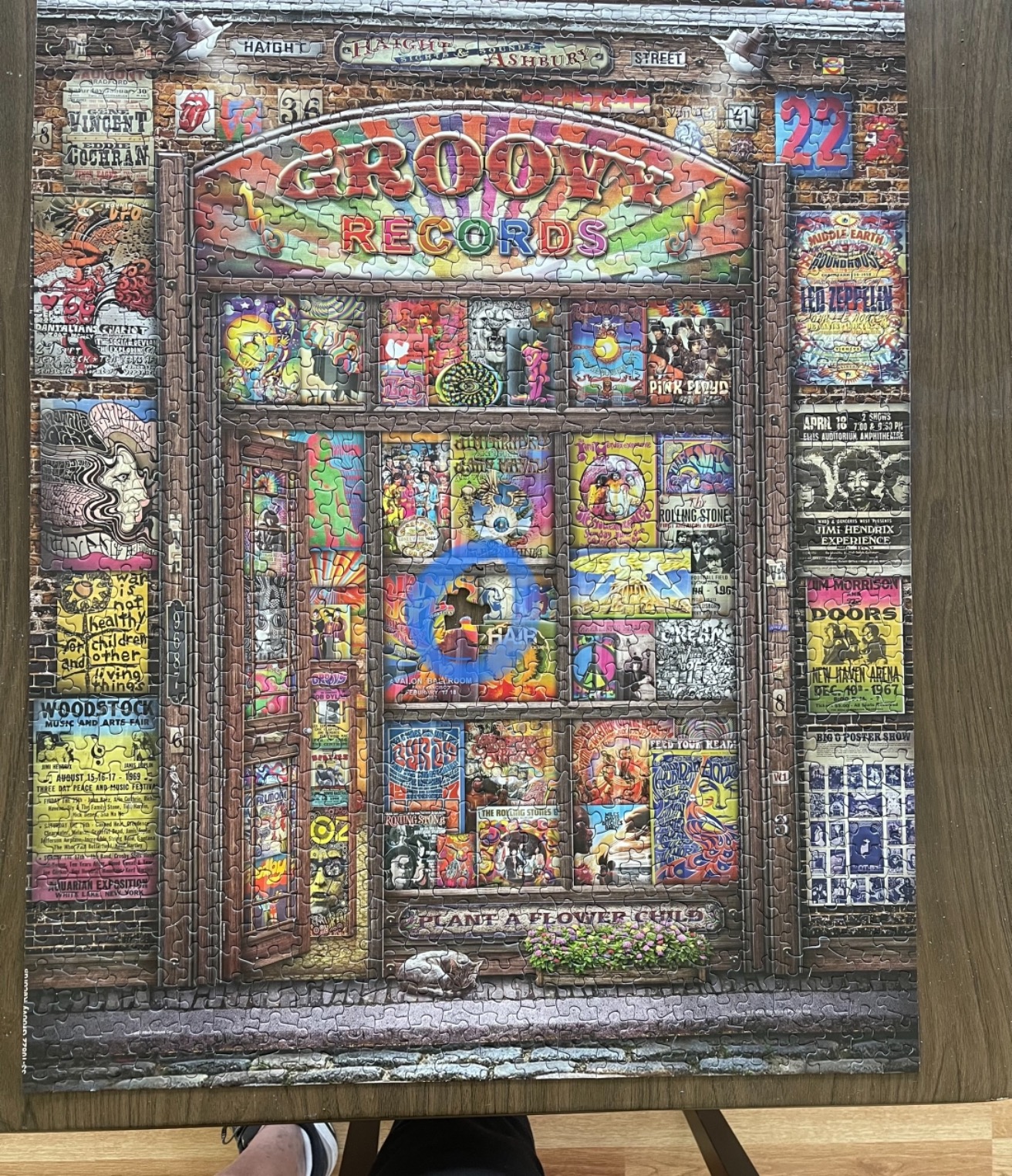 Groovy Records 1000 piece Jigsaw Puzzle for Adults features a colorful illustration of a classic record store customer photo 2