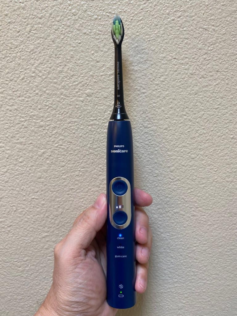 Philips Sonicare ProtectiveClean 6100 Rechargeable Electric Toothbrush, with Pressure Sensor, 3 Cleaning Modes, SmarTimer and QuadPacer, 14-Day Battery Life, Travel Case, White, Model HX6877/21 customer photo 2