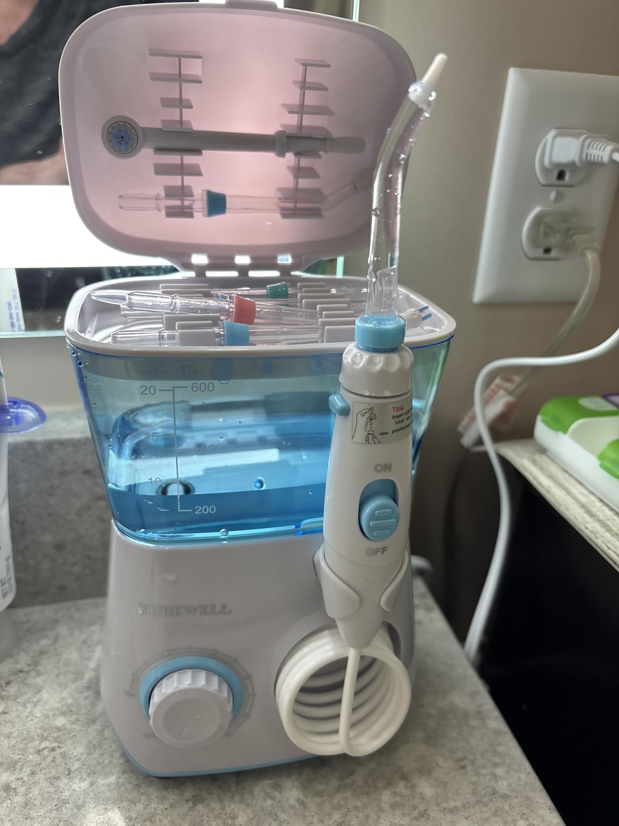 TUREWELL Water Flossing Oral Irrigator, 600ML Dental Teeth Cleaner 10 Adjustable Pressure, Electric Oral Flosser for Braces, 8 Replacement Jet Tips for Family (Black) customer photo 1