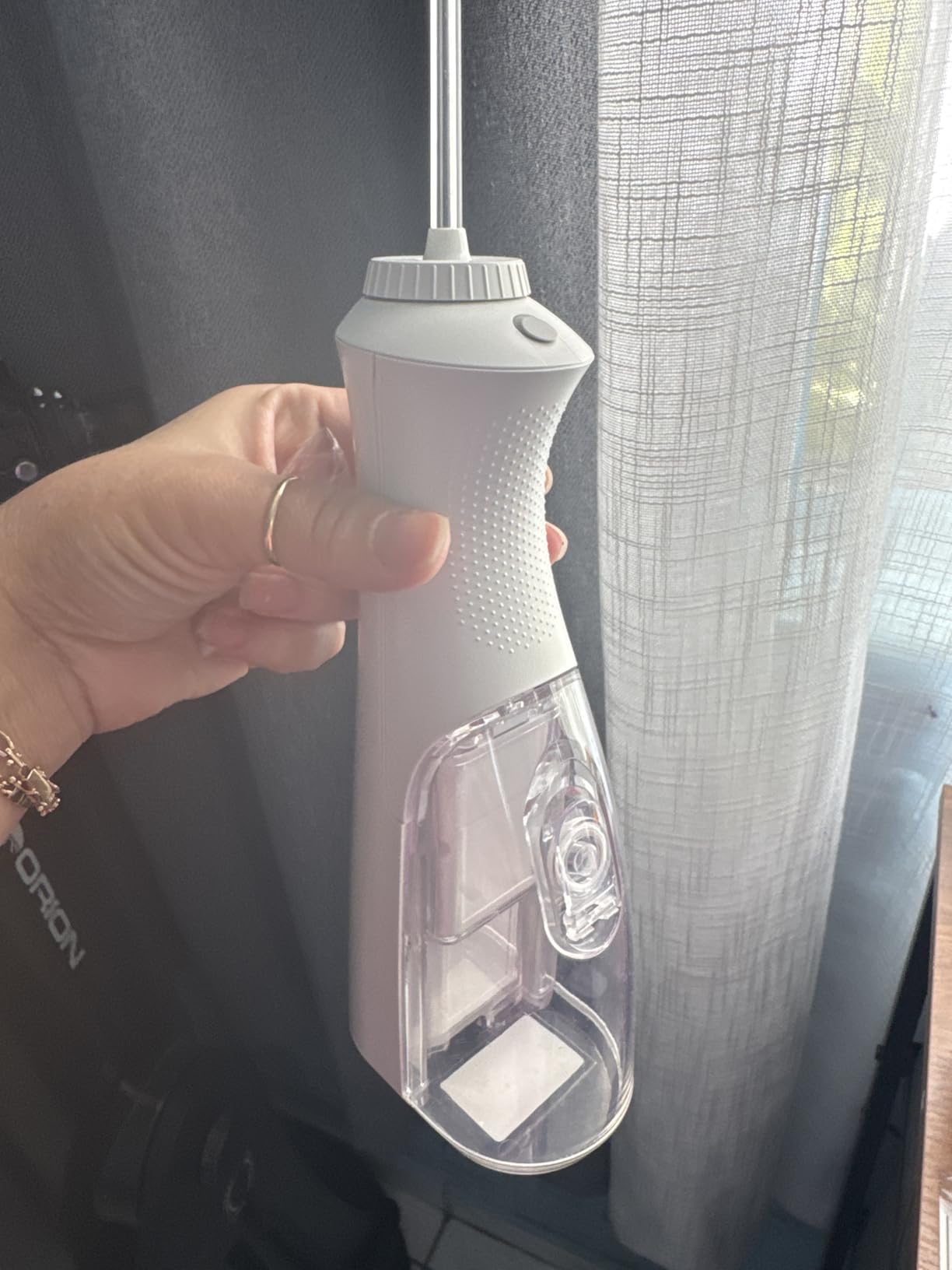 Waterpik Cordless Pearl Rechargeable Portable Water Flosser for Teeth, Gums, Braces Care and Travel, Extra Quiet, 4 Flossing Tips - ADA Accepted, WF-13 White, Amazon Exclusive customer photo 1