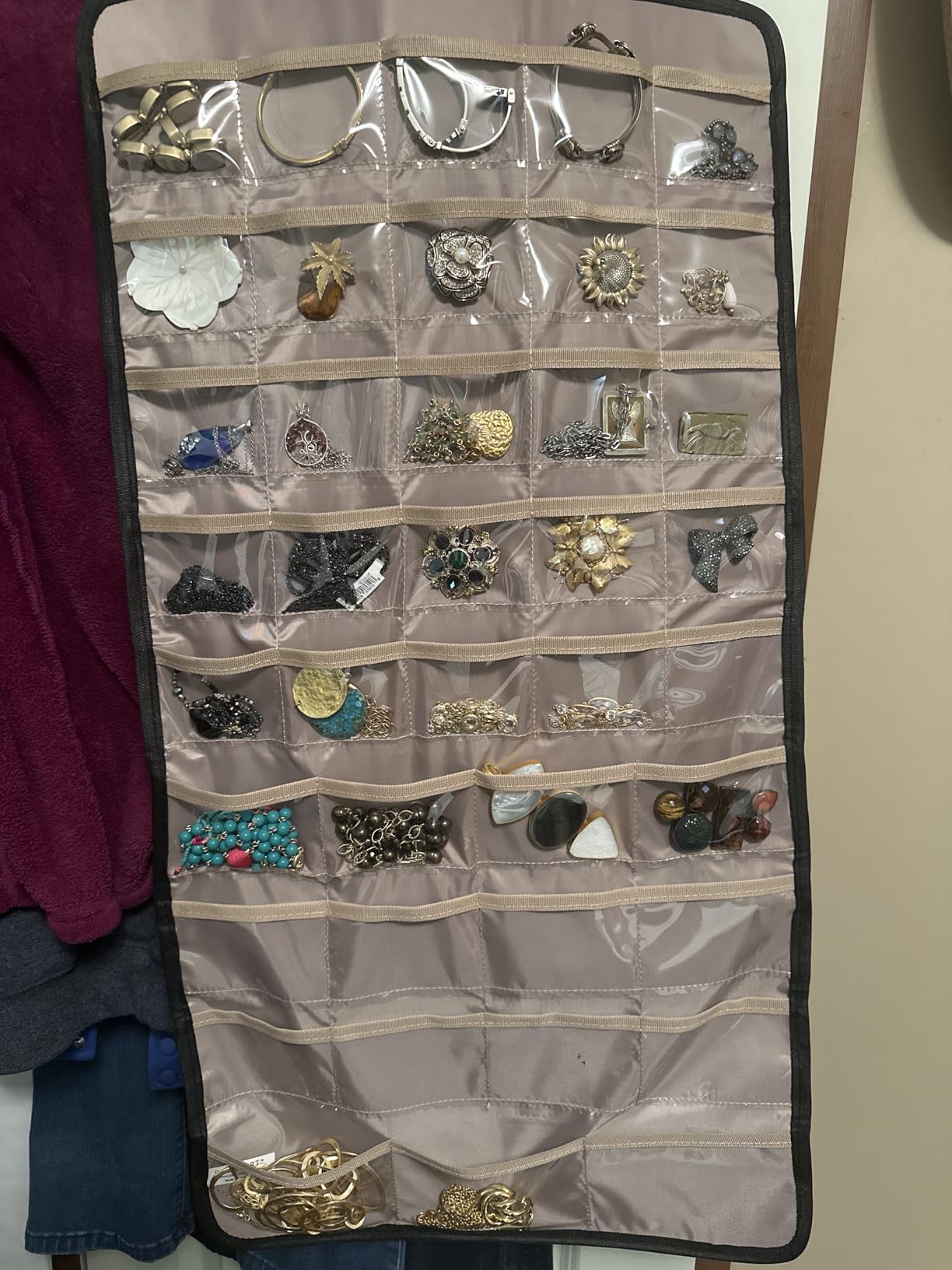 BAGSMART Hanging Jewelry Organizer Storage Roll with Hanger Metal Hooks Double-Sided Jewelry Holder for Earrings, Necklaces, Rings on Closet, Wall, Door, 1 piece, Large, Black customer photo 1
