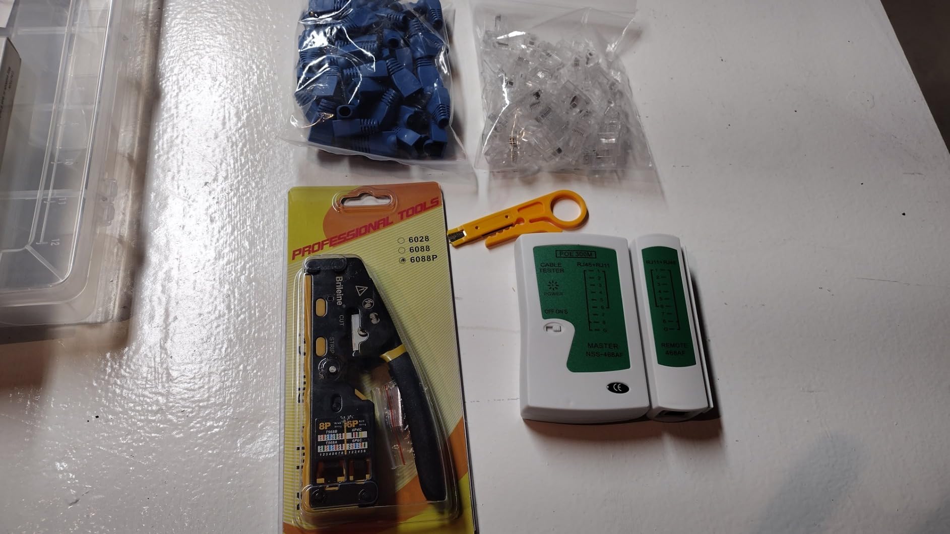 RJ45 Crimp Tool Pass Through Kit Ethernet Crimper Cat5 Cat5e Cat6 Crimping Tool for RJ11/RJ12 6P/8P with Network Lan Cable Tester, 50PCS Cat6 Connectors, 50PCS Boots, Mini Cable Stripper customer photo 1