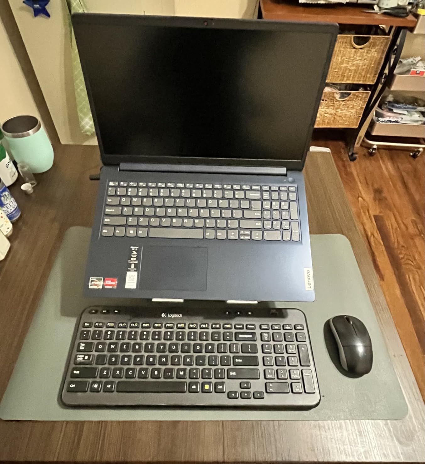 Amazon Basics Sturdy and Portable Ergonomic Laptop Stand for Desk, Height Adjustable Riser with Ventilated Cooling, Foldable, Fits all Laptops up to 15.6 Inch, Silver customer photo 1