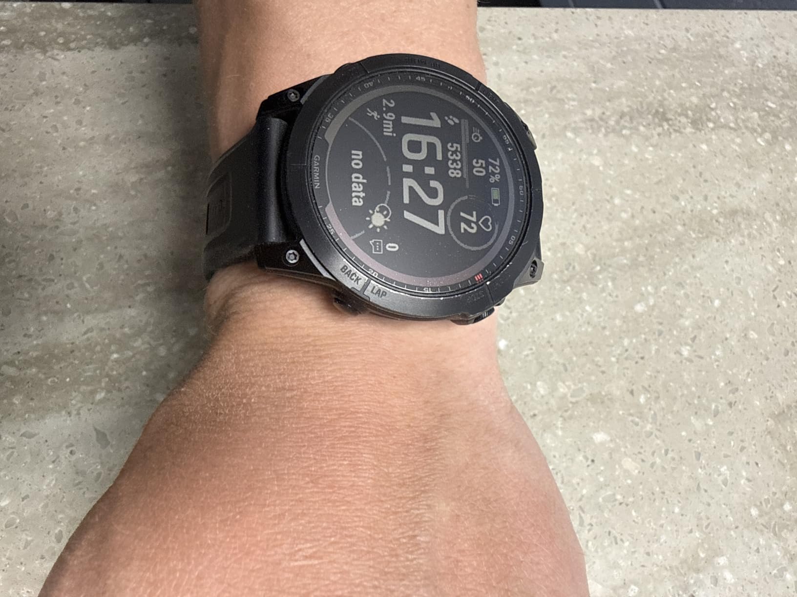 Garmin 010-02540-00 fenix 7, adventure smartwatch, rugged outdoor watch with GPS, touchscreen, health and wellness features, silver with graphite band (Renewed) customer photo 1