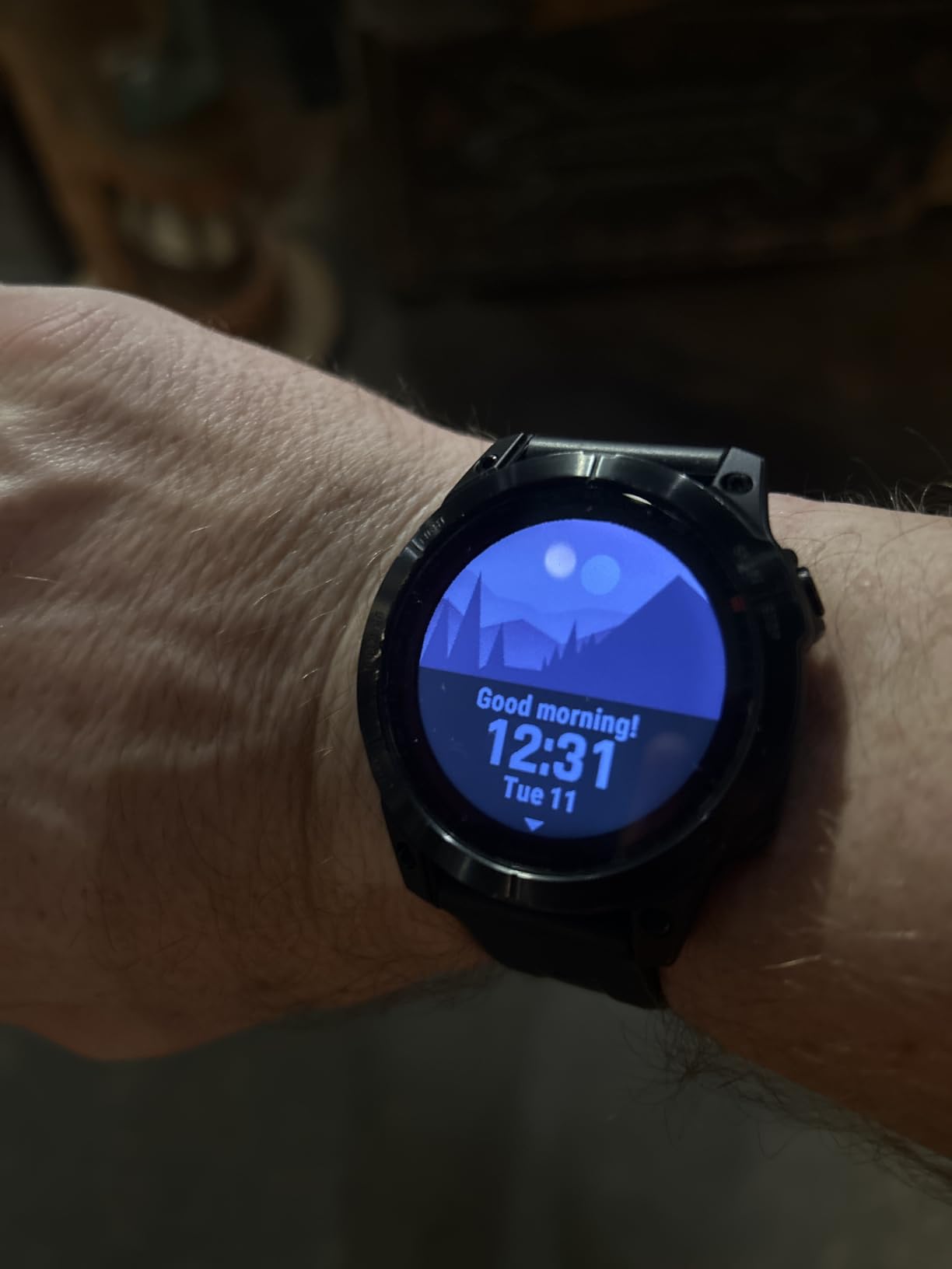 Garmin 010-02540-00 fenix 7, adventure smartwatch, rugged outdoor watch with GPS, touchscreen, health and wellness features, silver with graphite band (Renewed) customer photo 2