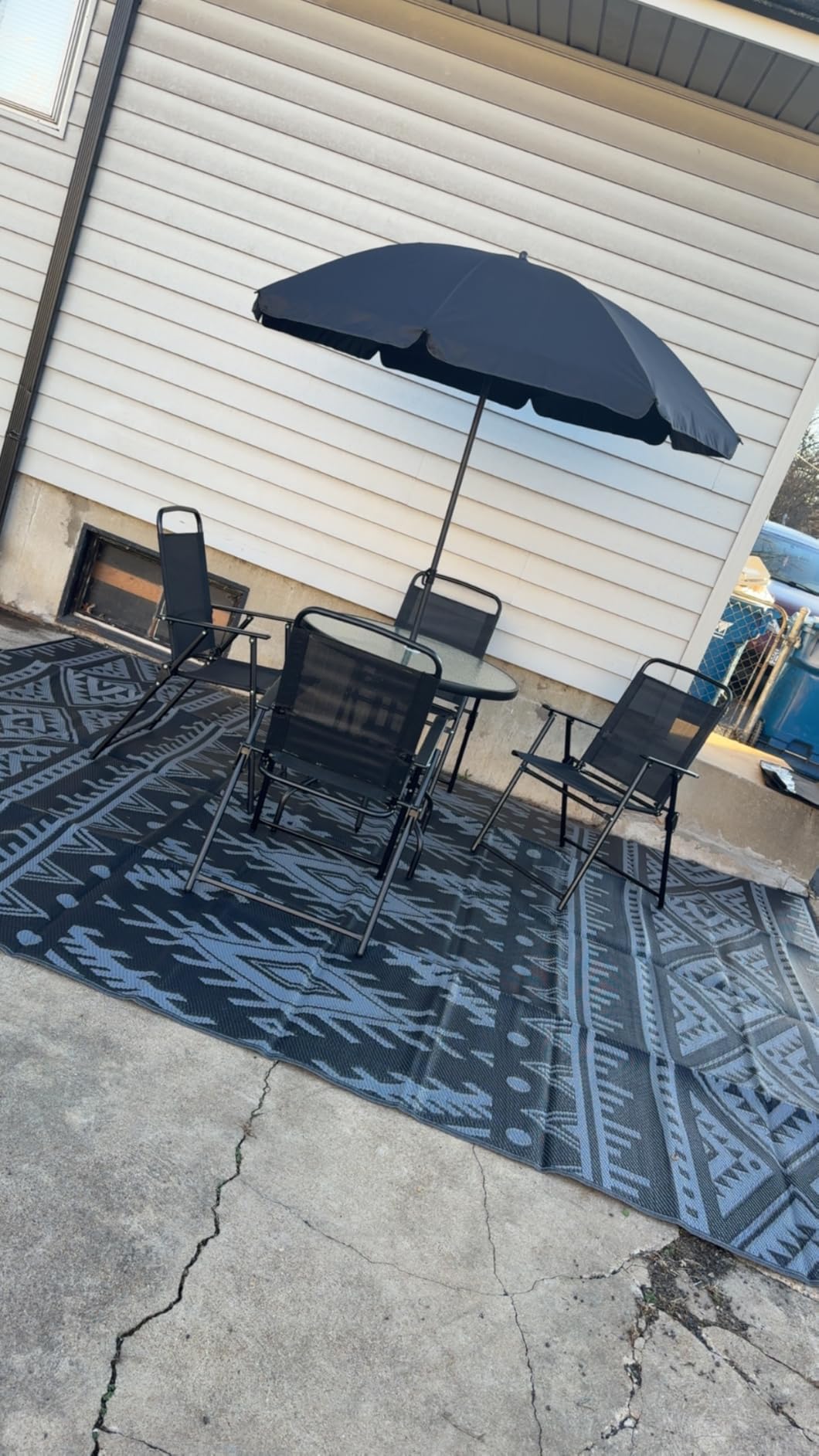 OLANLY Outdoor Rug Waterproof 5x8 ft, Reversible Outdoor Plastic Straw Rug, Boho Patio Rug, Indoor Outdoor Carpet, RV Mat Outside for Patio, Camp, Picnic, Balcony, Deck, Backyard, Black & White customer photo 1