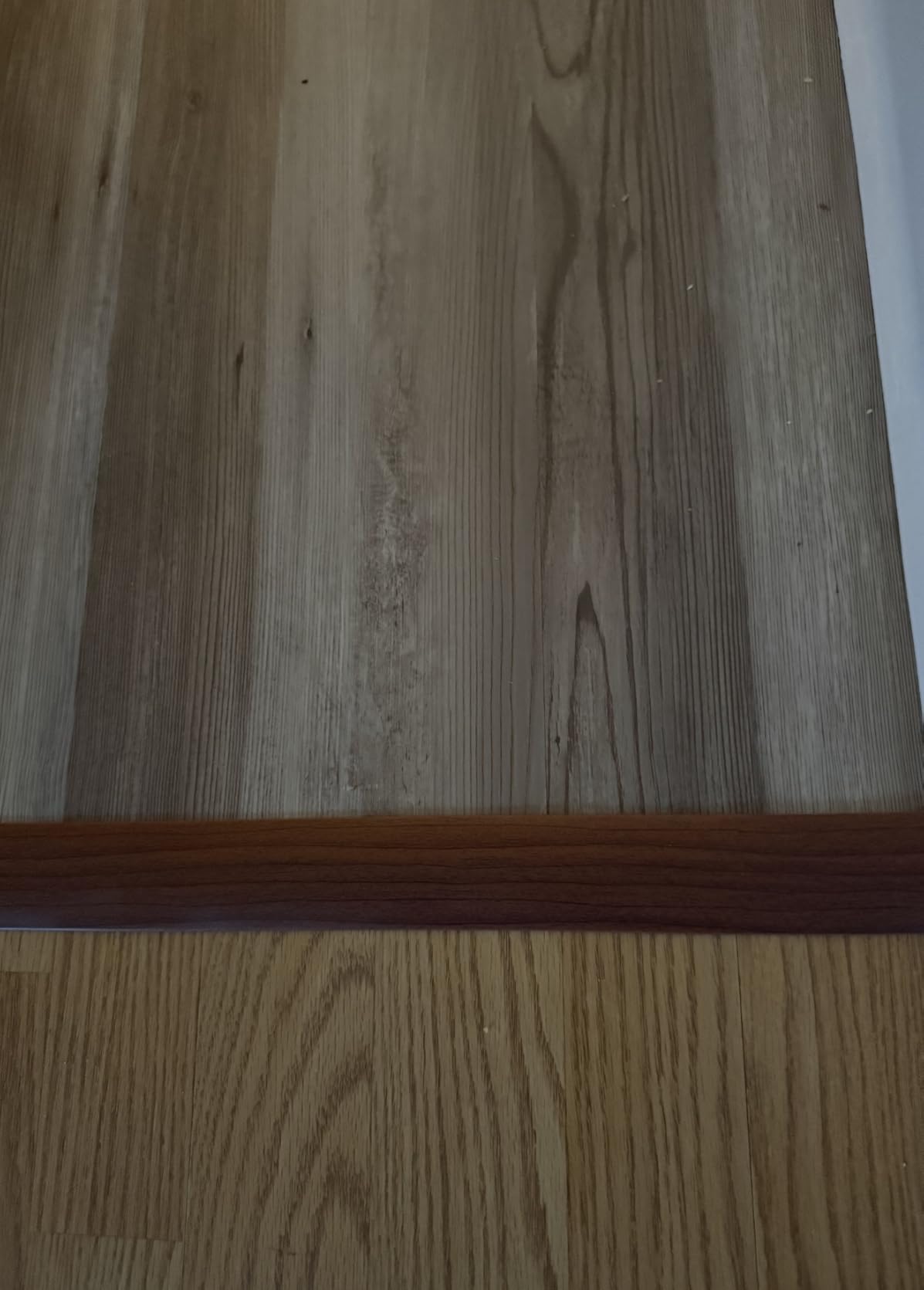 Floor Transition Strip - Self-Adhesive PVC Trim for Carpet to Flooring, Threshold Gap Cover (4ft x 1.57in, Grey Wood) customer photo 1