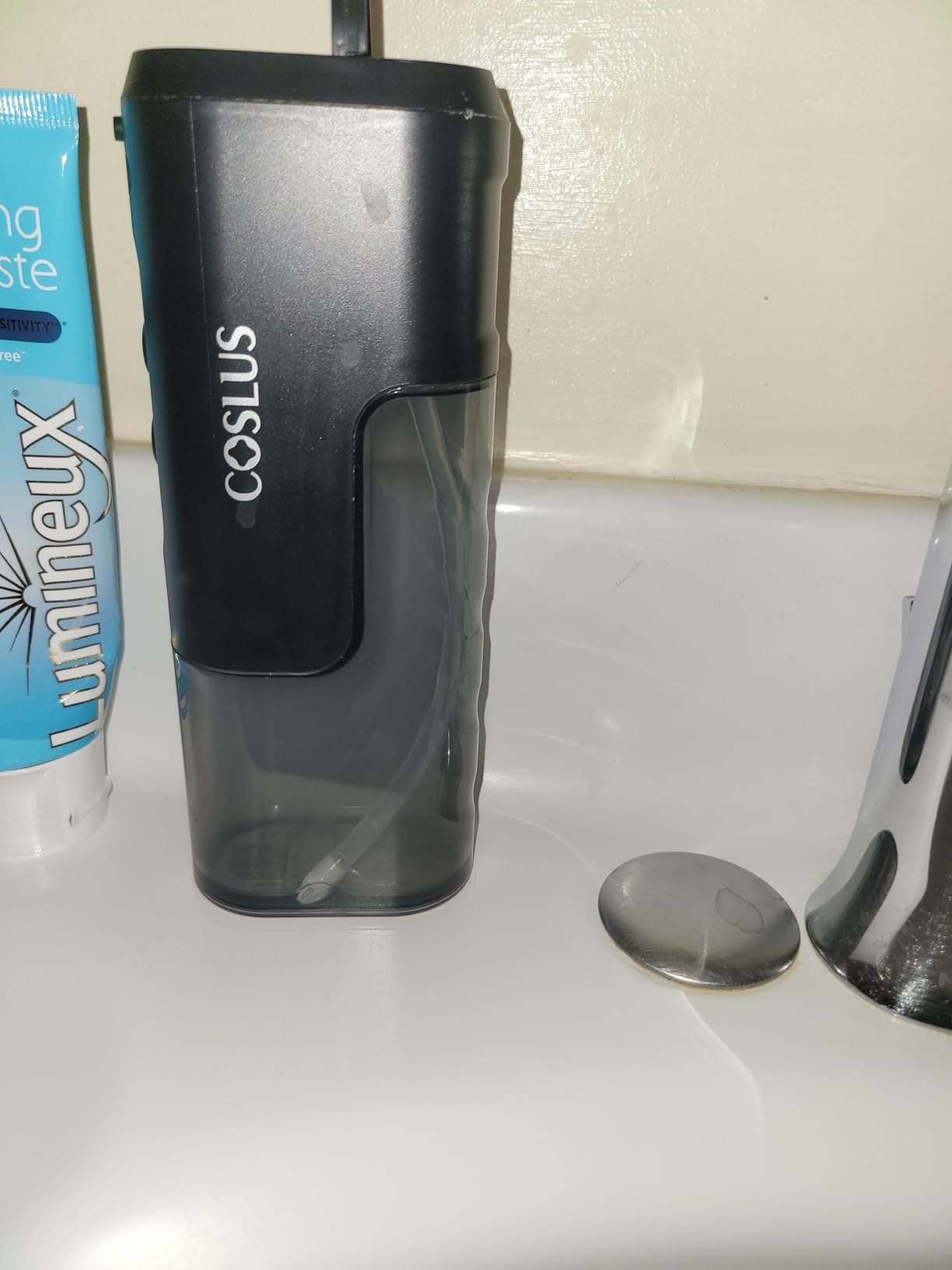 COSLUS T40 Mini Water Flosser for Travel: Portable Compact Design, Cordless Oral Irrigator with 4 Jet Tips Storable, IPX7 Waterproof for Braces, Orthodontic, Sensitive Gums Outing & Home, White customer photo 1