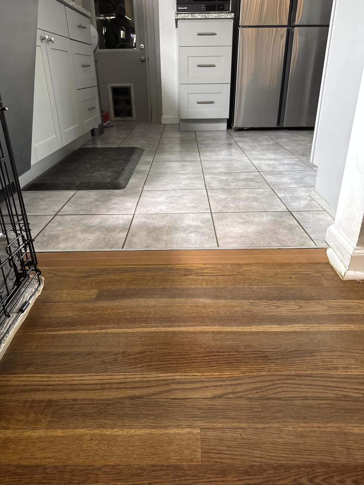 Floor Transition Strip Vinyl Door Threshold Ramp Self Adhesive Carpet Edging Strip Doorway Edge Trim, Overlap Edge Reducer for Laminate Carpet, Floor, Tile (Brown Wood Grain, 1/5' to 2/5', 3.3Ft) customer photo 2