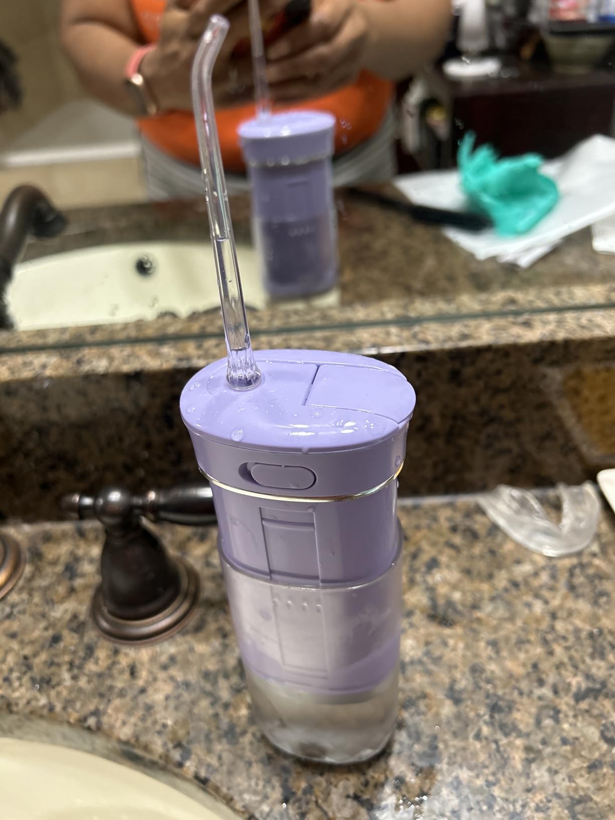 GuruNanda Compact Water Dental Flosser, Portable Travel Size Oral Irrigator Flosser with Collapsible 180 ml Tank, Smart Timer, 4 Flossing Modes, TSA-Friendly - Black customer photo 2
