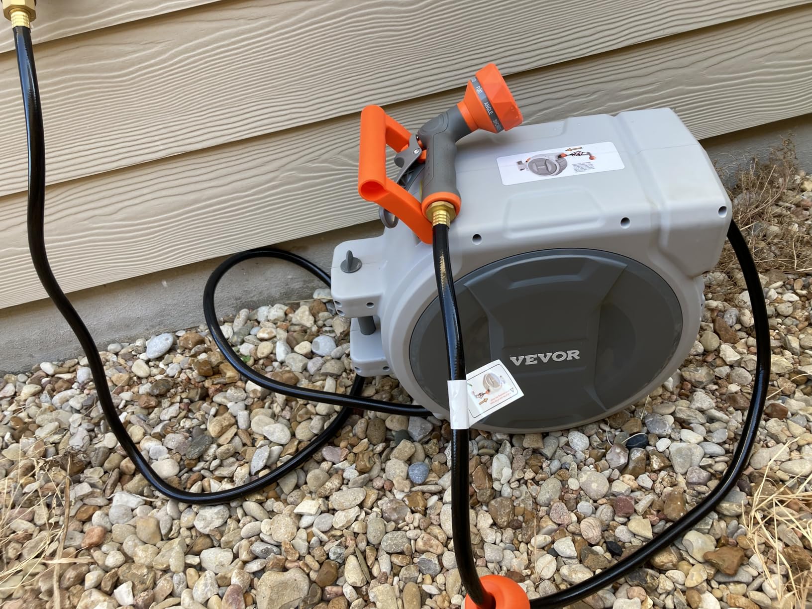 VEVOR Retractable Garden Hose Reel, 1/2 Inch x 84 ft Wall Mounted Heavy Duty Garden Hose Reel with 9 Patterns Nozzle, Any Length Lock, Upgraded Slow Return System and 180°Swivel Bracket customer photo 1