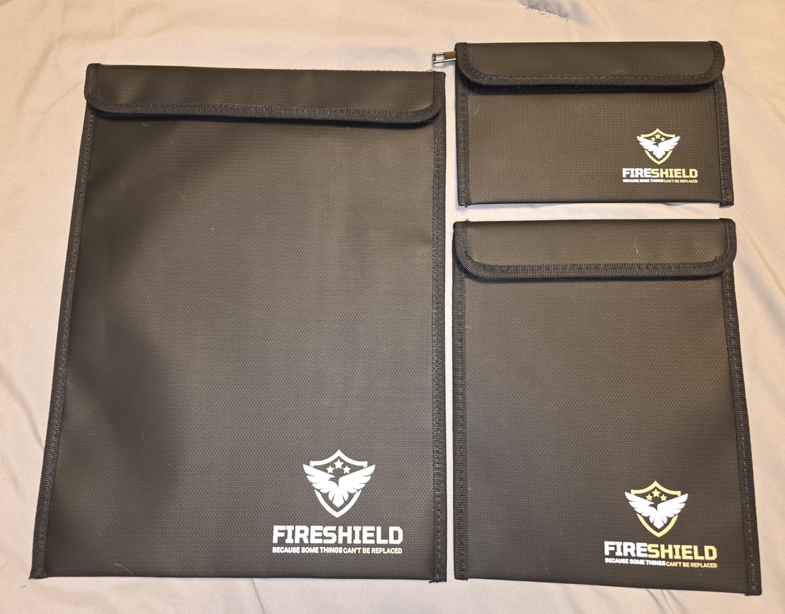FIRESHIELD PRO Upgraded 2000°F Fireproof Document Bag 3-Pack - Fire & Water Resistant Money Pouch for Cash - Safe Storage for Family Photos, Jewelry, Passport & Important Documents - Size: S, M & L customer photo 2