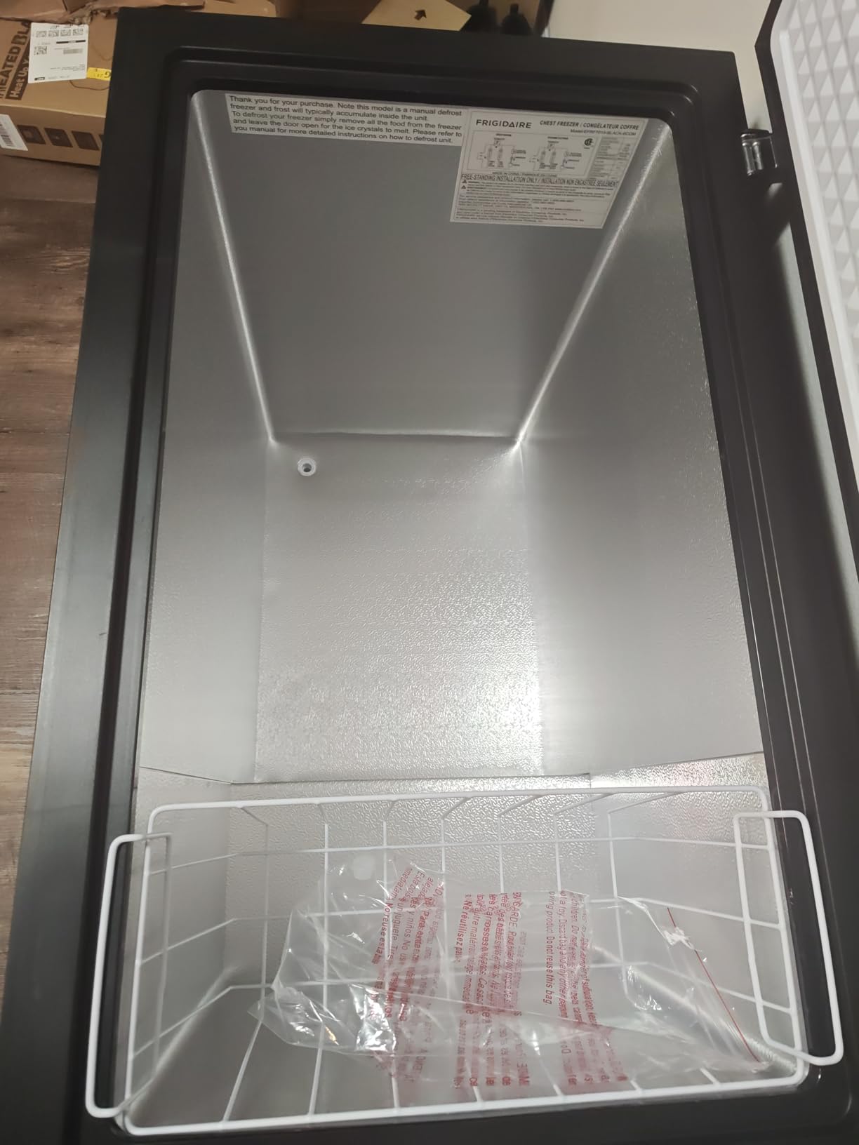 FRIGIDAIRE Chest Deep Freezer, 7 Cu. Ft, Black Adjustable Thermostat-Removable Vinyl Coated Wire Basket-Easy Defrost Drain, Eye-Catching Stainless Steel Top Door- Garage Ready customer photo 1