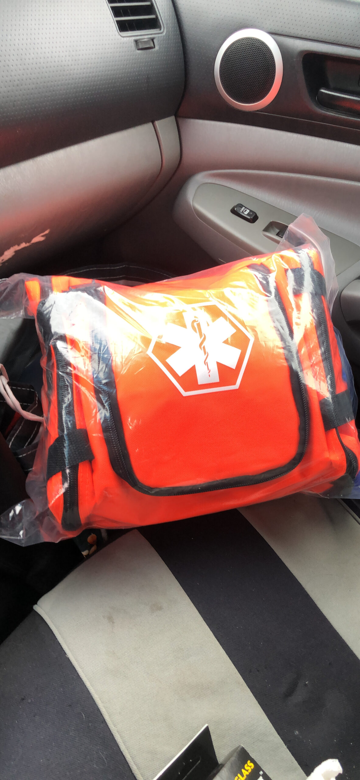 Fully Stocked Trauma First Aid Kit - First Responder II Bag with Tools, Gauze, Bandages, Scissors & Gloves - Compact & Portable - OSHA and ANSI Compliant - Red customer photo 1