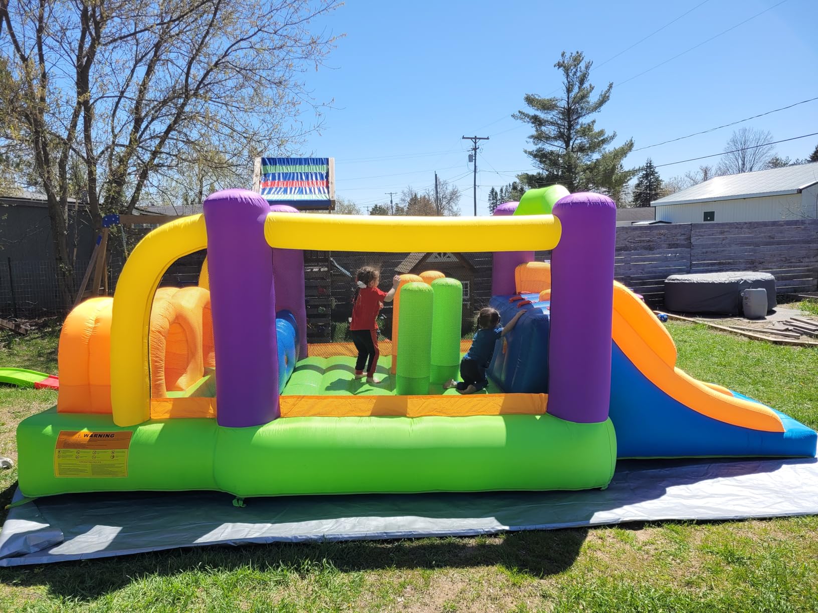 Bounceland Pro Racer Obstacle Bounce House with Dual Slides, Bounce, Climb, Slide All in One, UL 1 HP Blower Included, 19 ft x 9 ft x 7 ft H, Great for Big Party, Fun Racing Game in Teams customer photo 1
