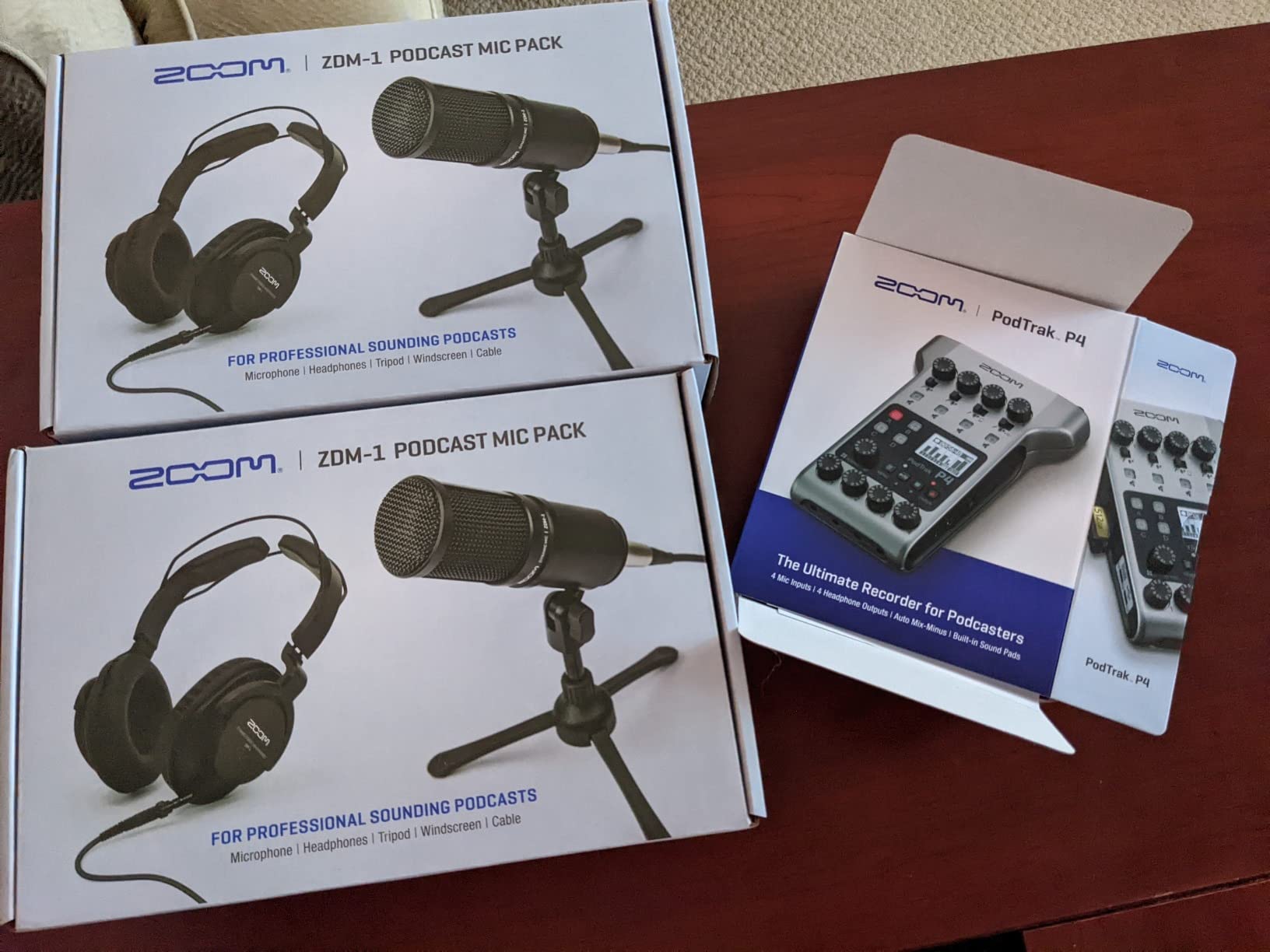 Zoom PodTrak P4 Portable Multitrack Podcast Recorder + 4X Zoom M-1 Mic + 4X Headphones + Windscreens + XLR Cables + 4X Tabletop Stand + Cloth - 4 Person Podcasting Mic Pack Bundle customer photo 1
