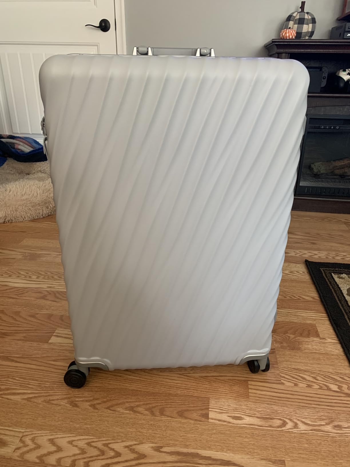 TUMI Voyageur Leger 4 Wheeled Luggage - Women's Lightweight and Spacious, Sleek Silhouette, Durable Premium Suitcase - 21.8