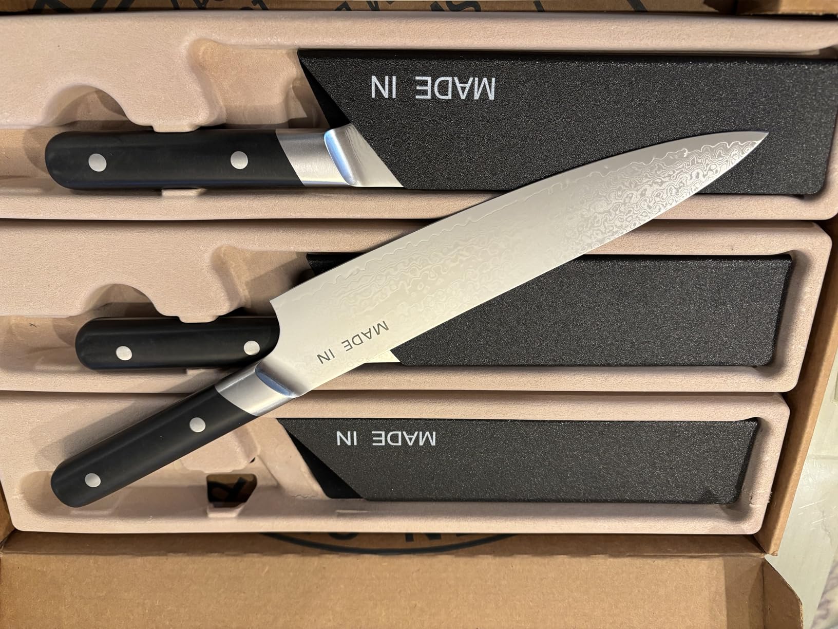 Made In Cookware | 3-piece Japanese Damascus Steel Knife Set (Includes Gyuto, Nakiri and Santoku) | 66 Layers of Damascus Steel with a VG-10 Core | Crafted in Japan | Full Tang With Black POM Handle customer photo 2
