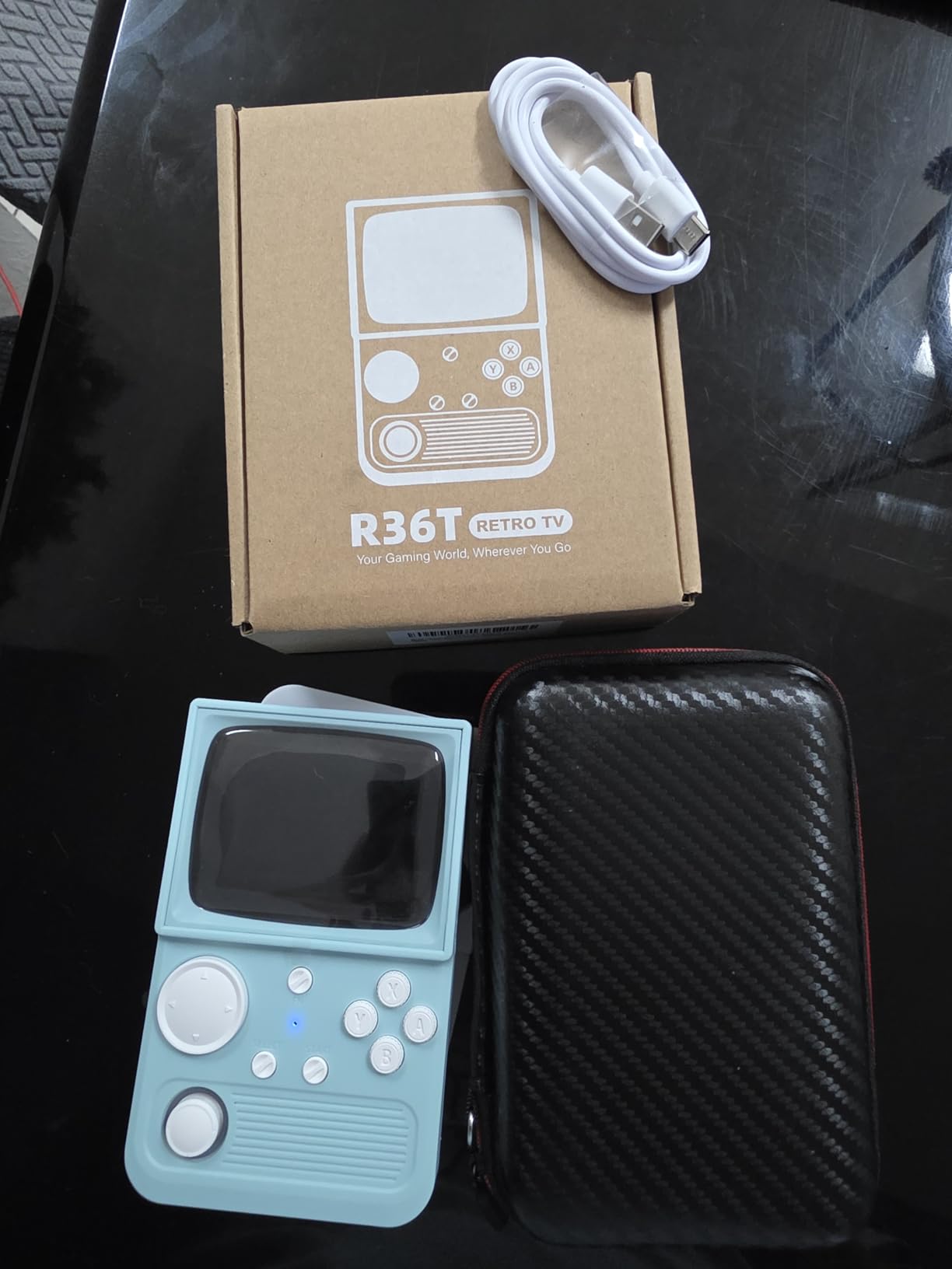 R36 Max Retro Gaming Console, Retro Handheld Console 4.0'' Screen Linux System, 64G TF Card, 4000mAh Rechargeable Portable Pocket Arcade, Transparent Blue customer photo 2