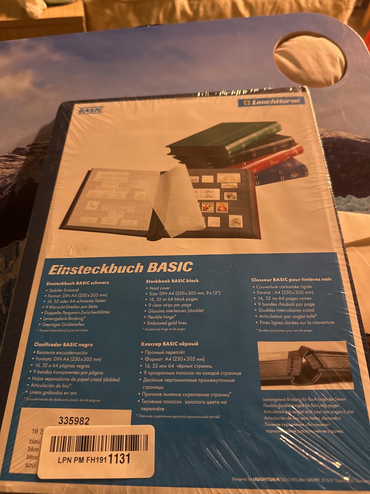 LIGHTHOUSE - BASIC Hard Cover Stockbook for Stamps - 64 Black Cardstock A4 Pages with Clear Strips and Double Linen Hinges - Red customer photo 1