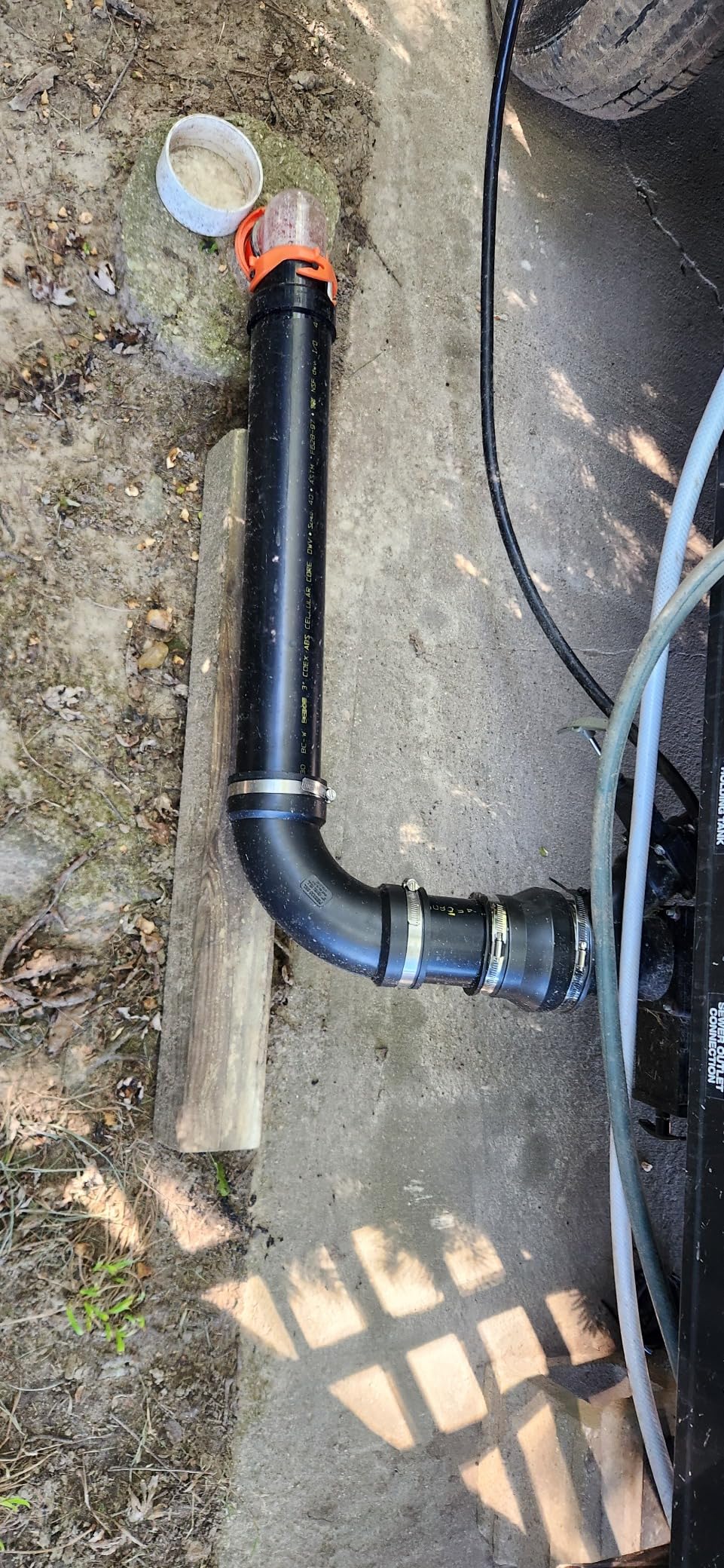 Camco RhinoFlex Clear RV Sewer Hose Elbow with 4-in-1 Adapter - Features a 360-Degree Fitting Rotation and Built-in Gasket for Odor-Tight Protection - Fits 4 Sizes of Dump Station Inlets (39736) customer photo 1