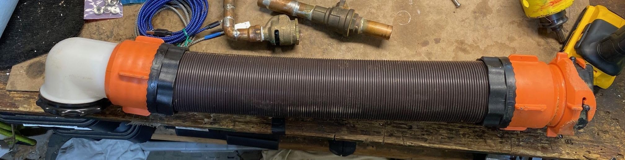 Camco RhinoFLEX 10' Camper/RV Sewer Hose Extension - Features Collapsible Design for RV Storage - Includes Pre-Attached Lug & Bayonet Fitting -Heavy Duty Polyolefin & Reinforced w/Steel Wire (39774) customer photo 2