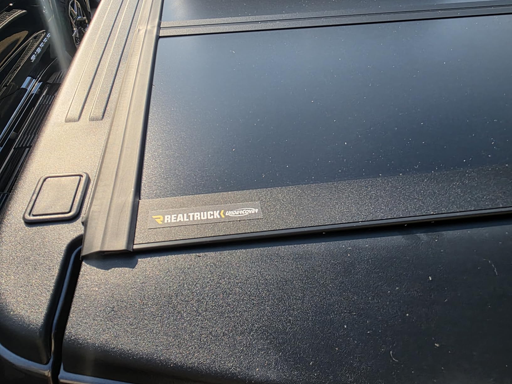 Undercover ArmorFlex Hard Folding Truck Bed Tonneau Cover | AX32008 | Fits 2019-2025 Dodge Ram 1500, Does Not Fit w/Multi-Function (Split) Tailgate 5' 7