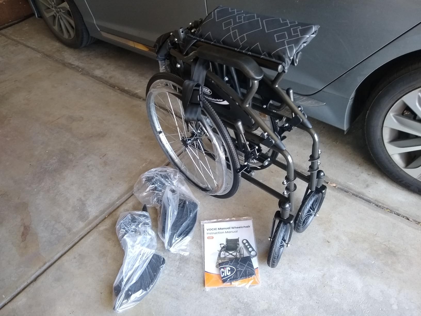 VOCIC Ultra Lightweight Wheelchair for Adults, 23lb Frame Portable Foldable Self-Propelled Wheelchairs for Seniors with Quick Release Wheels, Swing-Away Footrests,Flip-Back Arm, 300 lbs Black customer photo 1