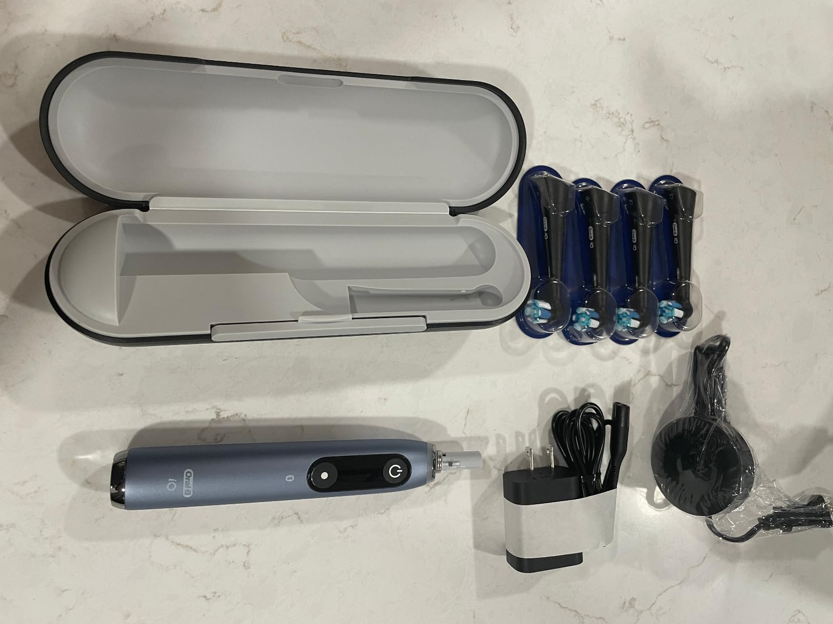 Oral-B iO9 Genius Rechargeable Electric Toothbrush, 7 Cleaning Modes, Interactive Display, Charging Travel Case, Visible Pressure Sensor, 4 Brush Heads, White Alabaster customer photo 2