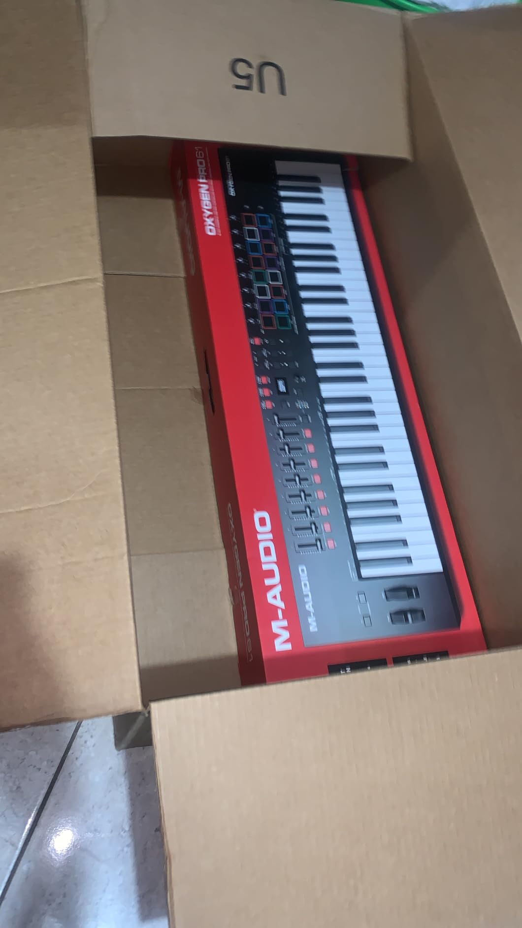M-Audio Oxygen Pro 49 Key USB MIDI Keyboard Controller With Beat Pads, MIDI-assignable Knobs, Buttons and Faders, and Native Instruments Sound Package (NKS Integration) customer photo 1