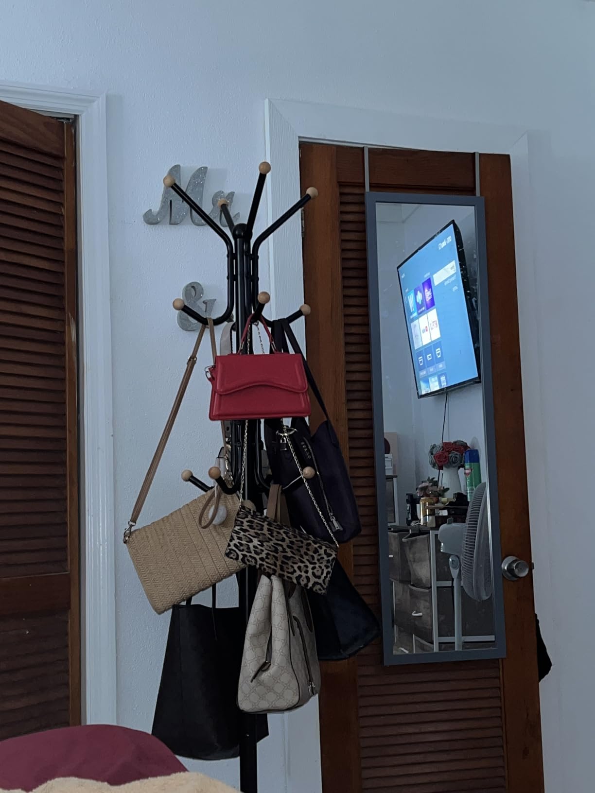 SONGMICS Coat Rack Freestanding, Metal Coat Rack Stand with 12 Hooks and 4 Legs, Holds Clothes, Hats, and Bags, for Entryway, Living Room, Bedroom, Black URCR031B01 customer photo 2